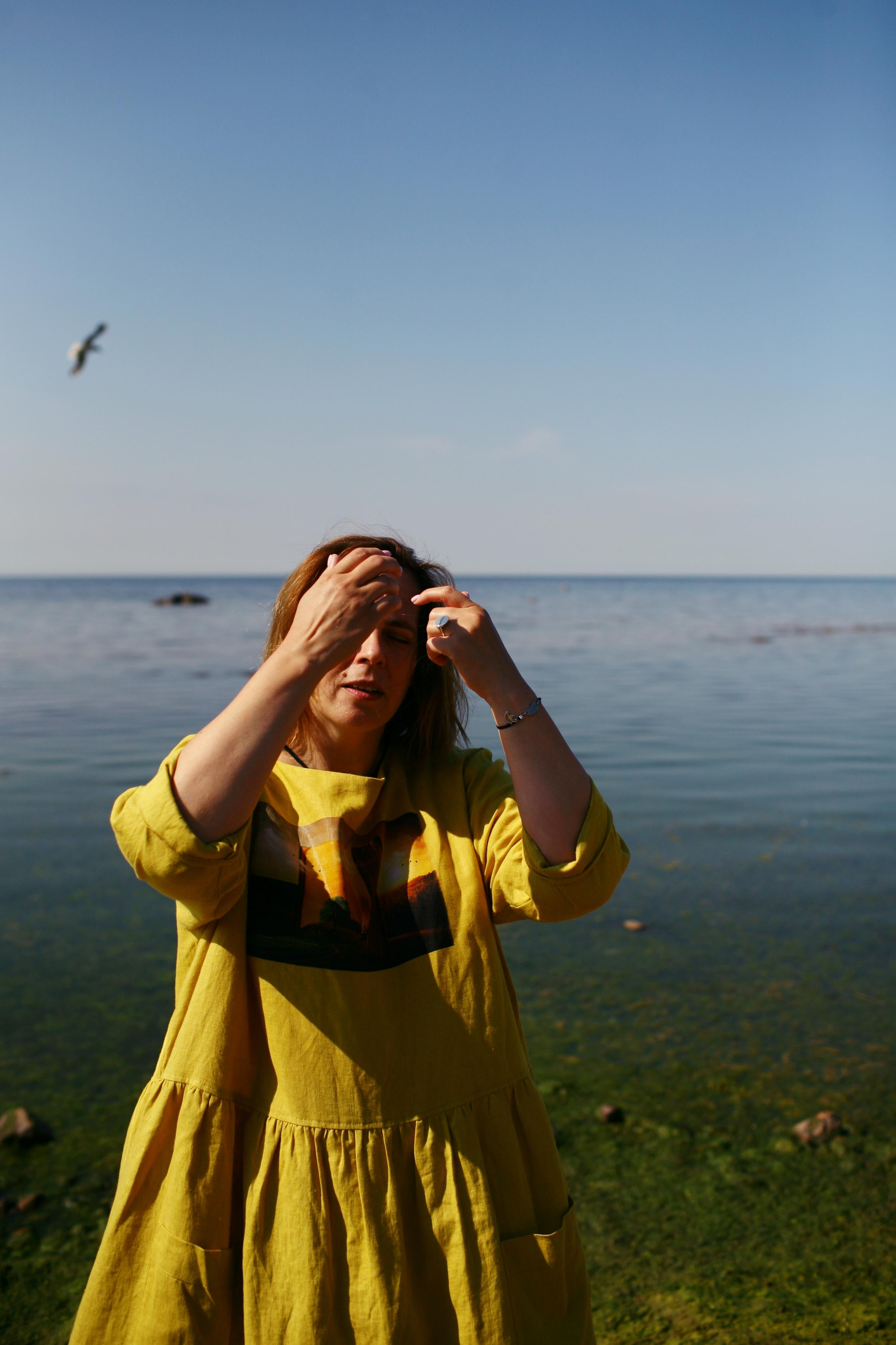 Anna, by herself. Stones and sand. Victoria Dini. Art photography in London / Folkestone, UK