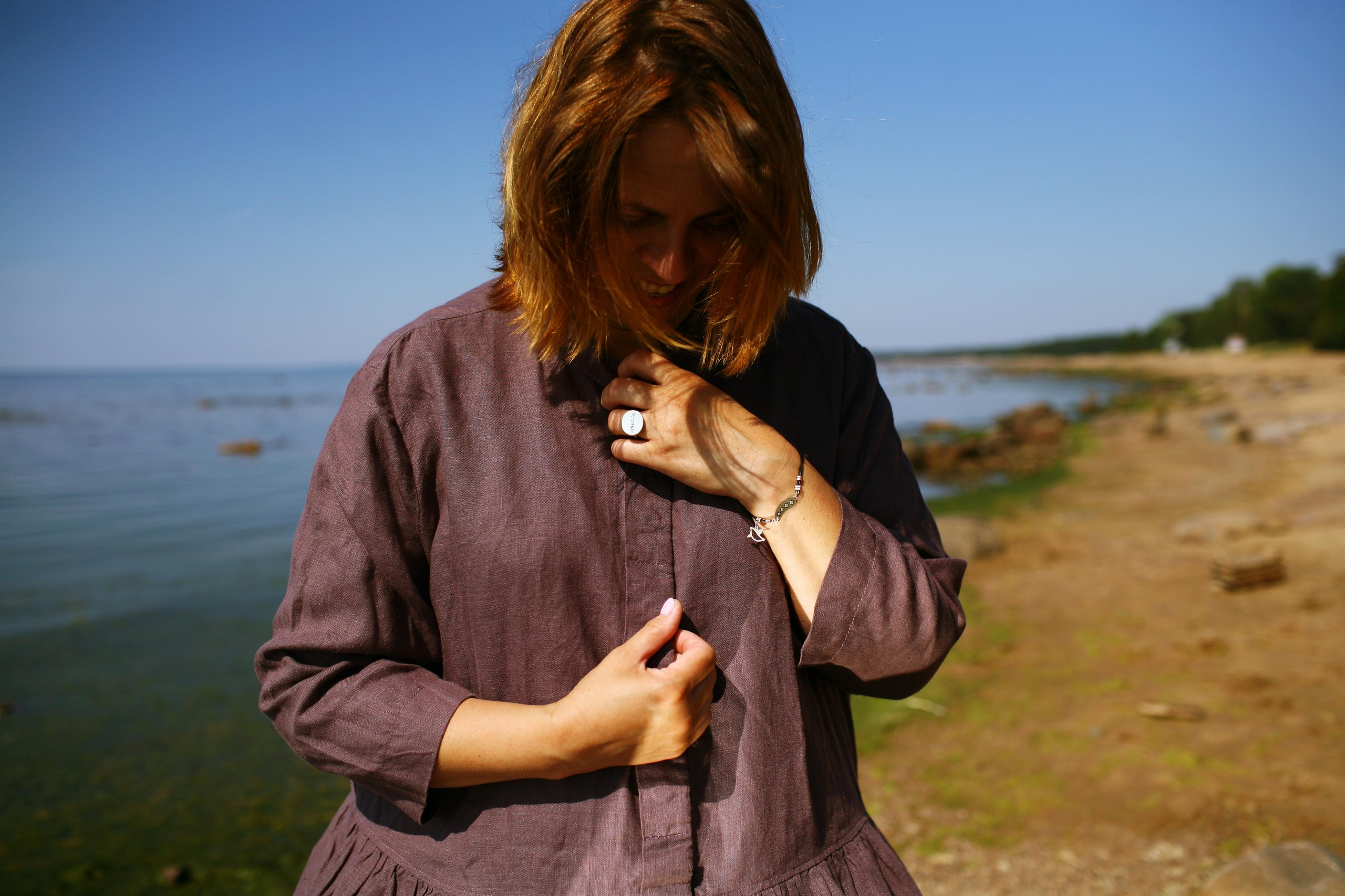Anna, by herself. Stones and sand. Victoria Dini. Art photography in London / Folkestone, UK
