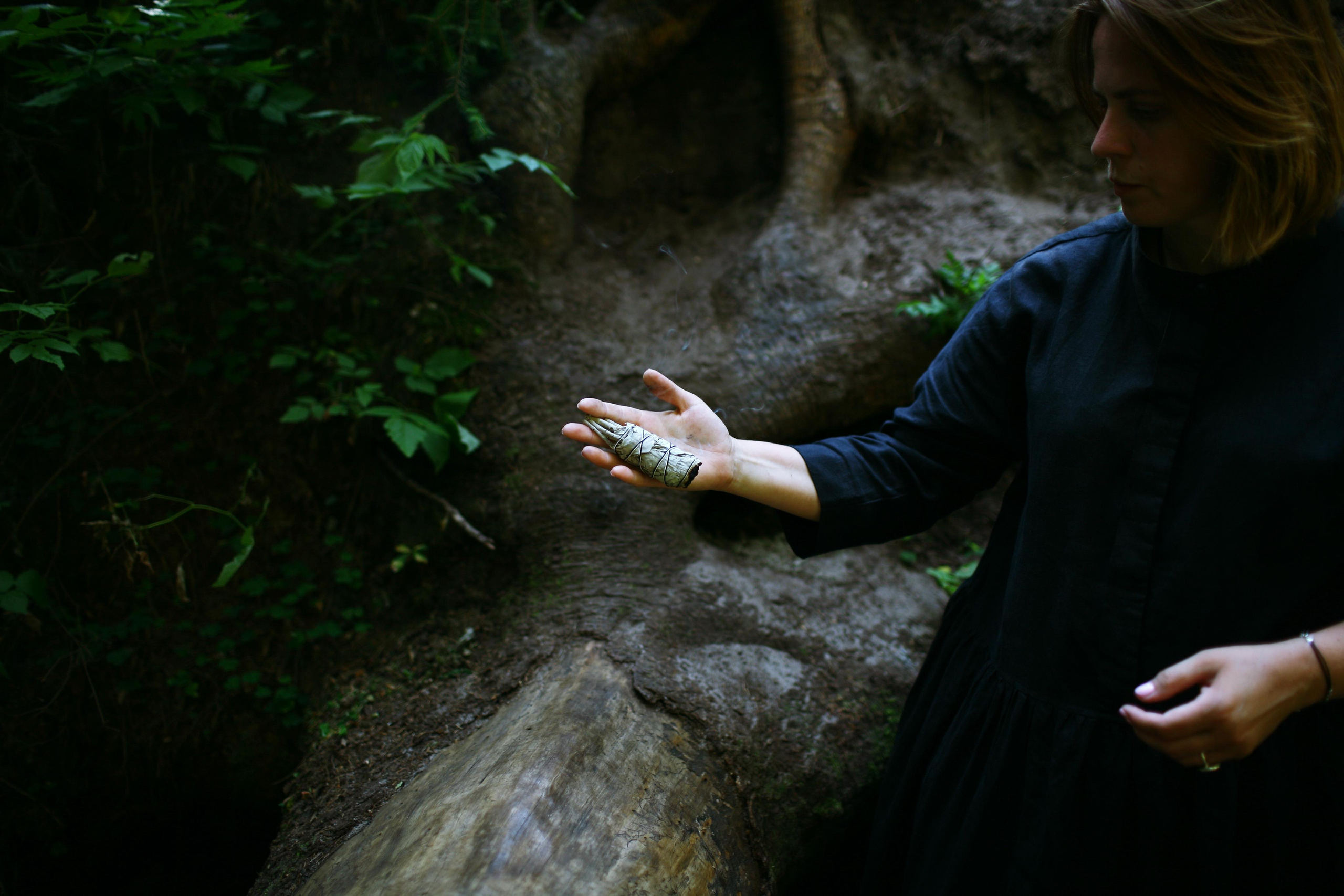 Anna, by herself. Woods and a little bit fire. Victoria Dini. Art photography in London / Folkestone, UK