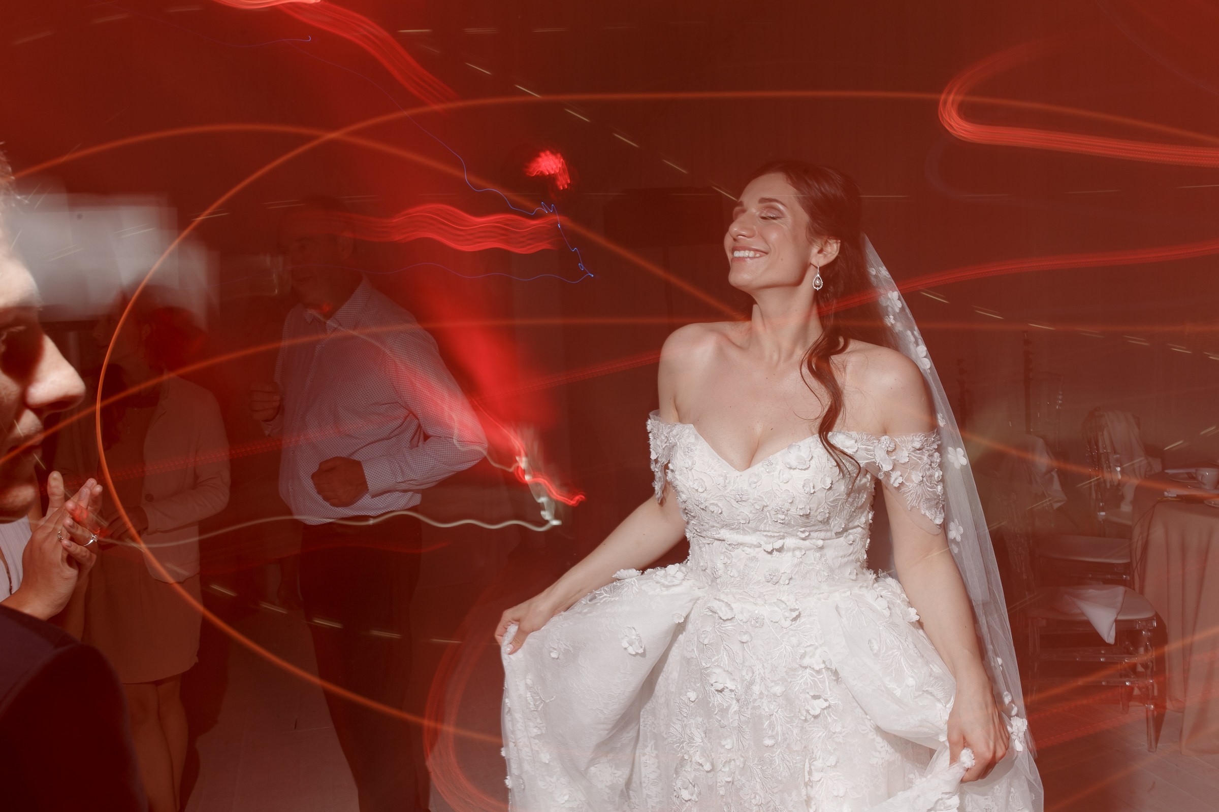 Bride’s evening dancefloor  portrait, by Cornwall wedding photographer.