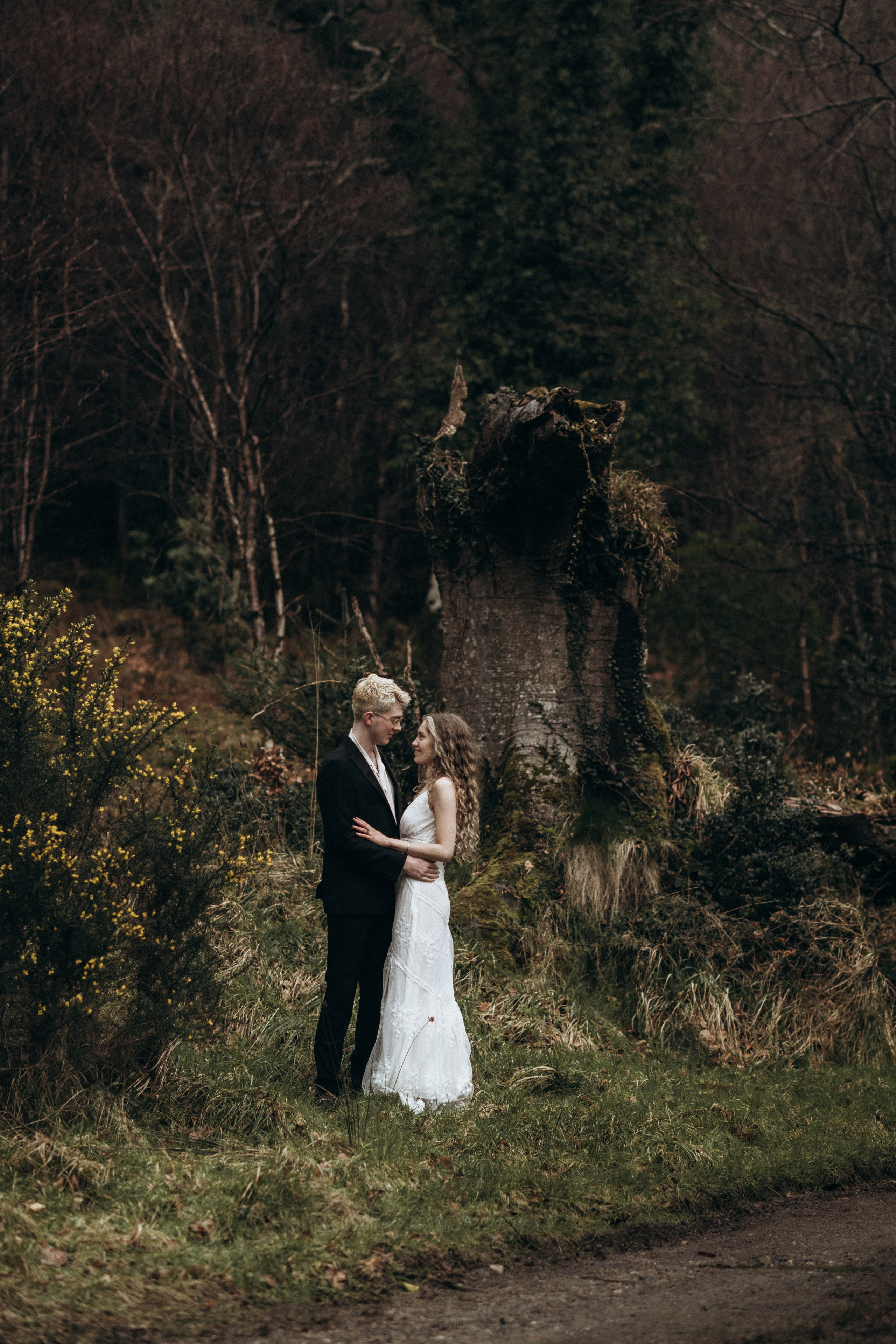 young woman and and man in the forest