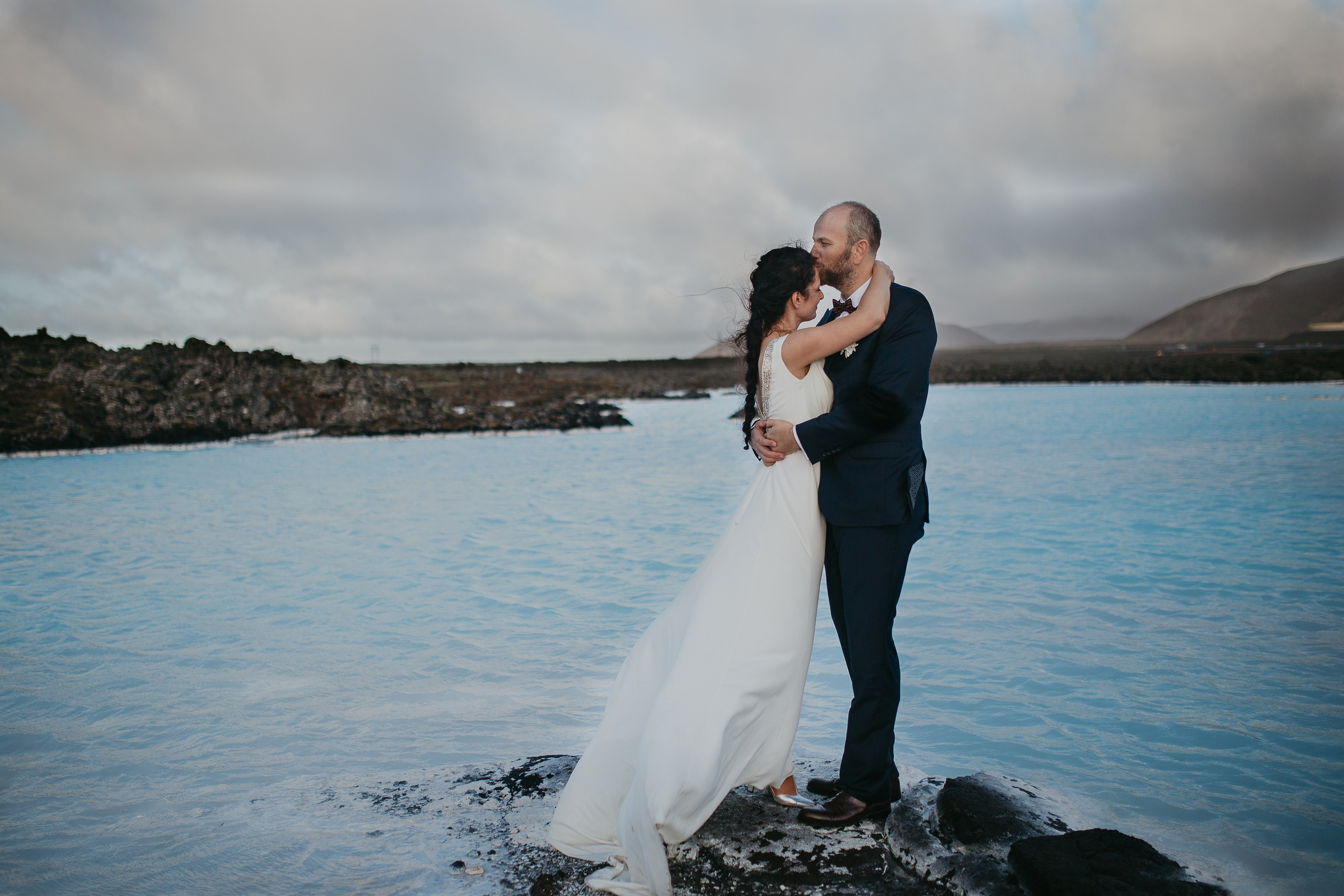 Candid couple’s moment in Iceland’s untamed wilderness, where love meets adventure, Blue LAgoon Iceland