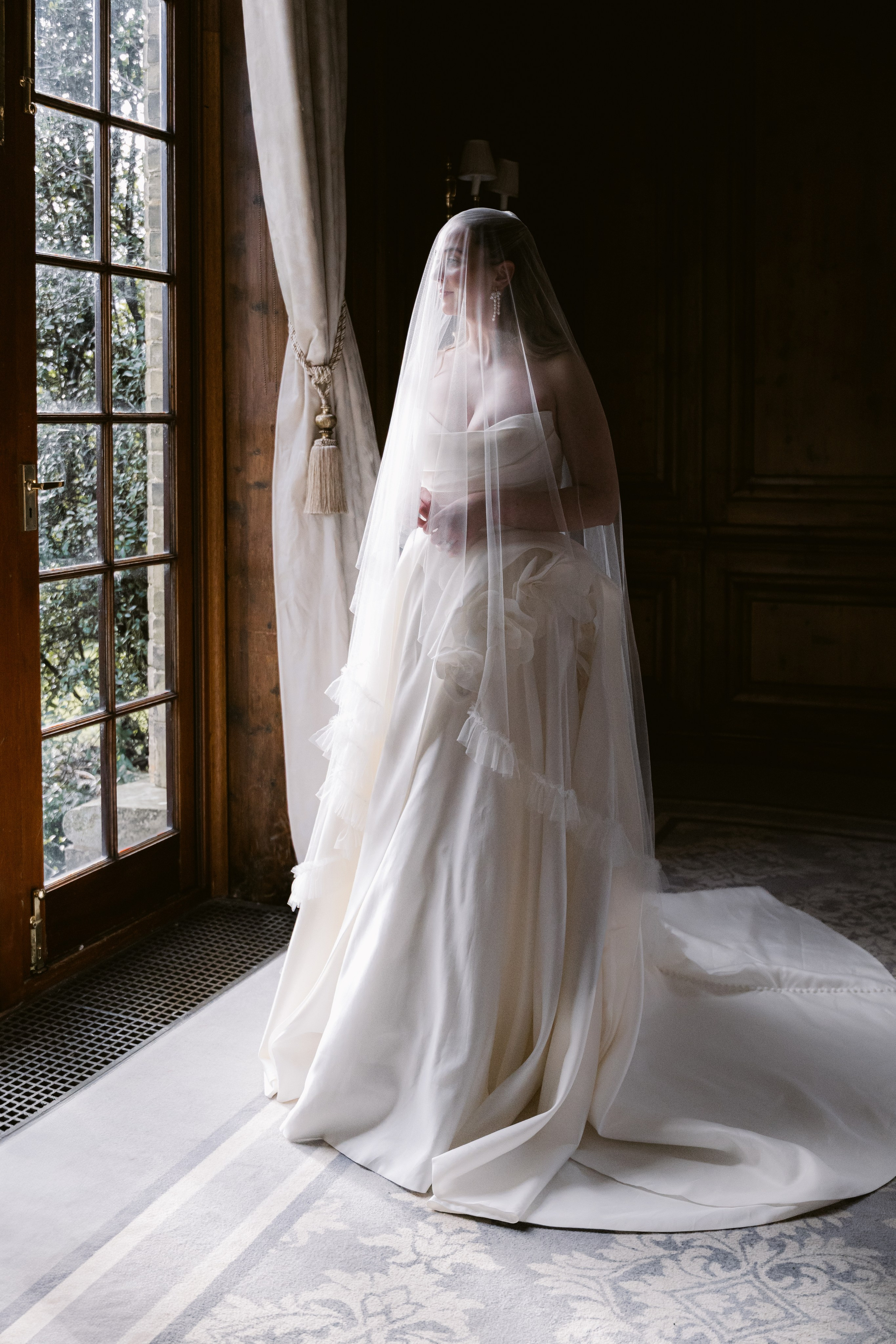 Elegant wedding portrait of bride and groom walking through the streets of ParisRomantic elopement moment captured in soft evening light in Paris, FranceLuxury wedding ceremony setup in a historic French venue with natural floralsCandid black and white photo of a couple at their city wedding in London, UKTimeless couple portrait in front of Marylebone Town Hall, LondonEditorial-style bridal preparation in a classic townhouse in the heart of LondonSoft light bridal portrait in a countryside château wedding in FranceFine art flat lay with French-inspired wedding details and vintage texturesCinematic golden hour photo at a UK estate wedding with historic architectureLuxury wedding tablescape with candles and florals at a London reception