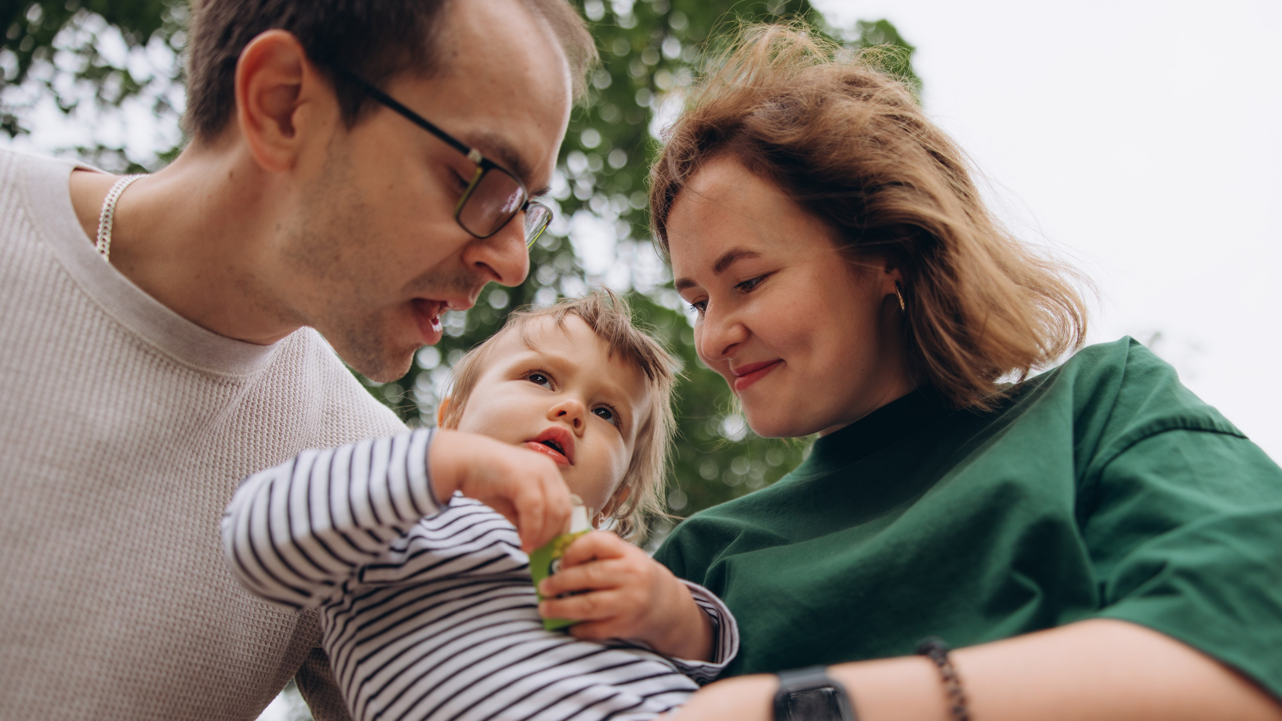 Milena with parents (Greenwich Park). Anastasia Klink, Photographer in London