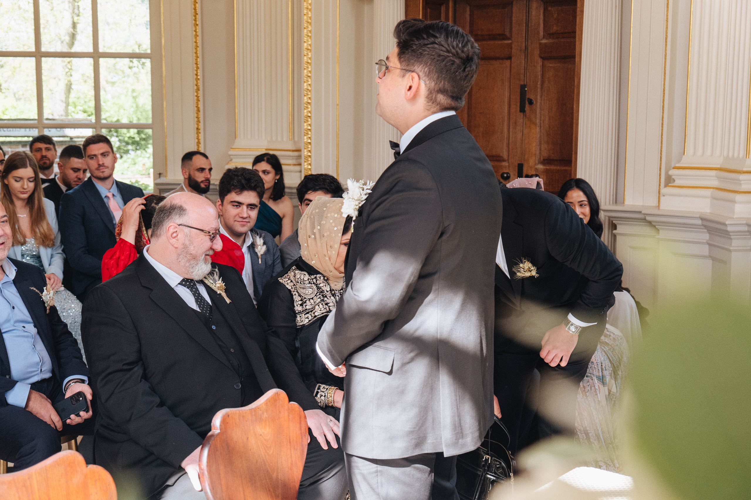 groom is waiting for the bride at the venue