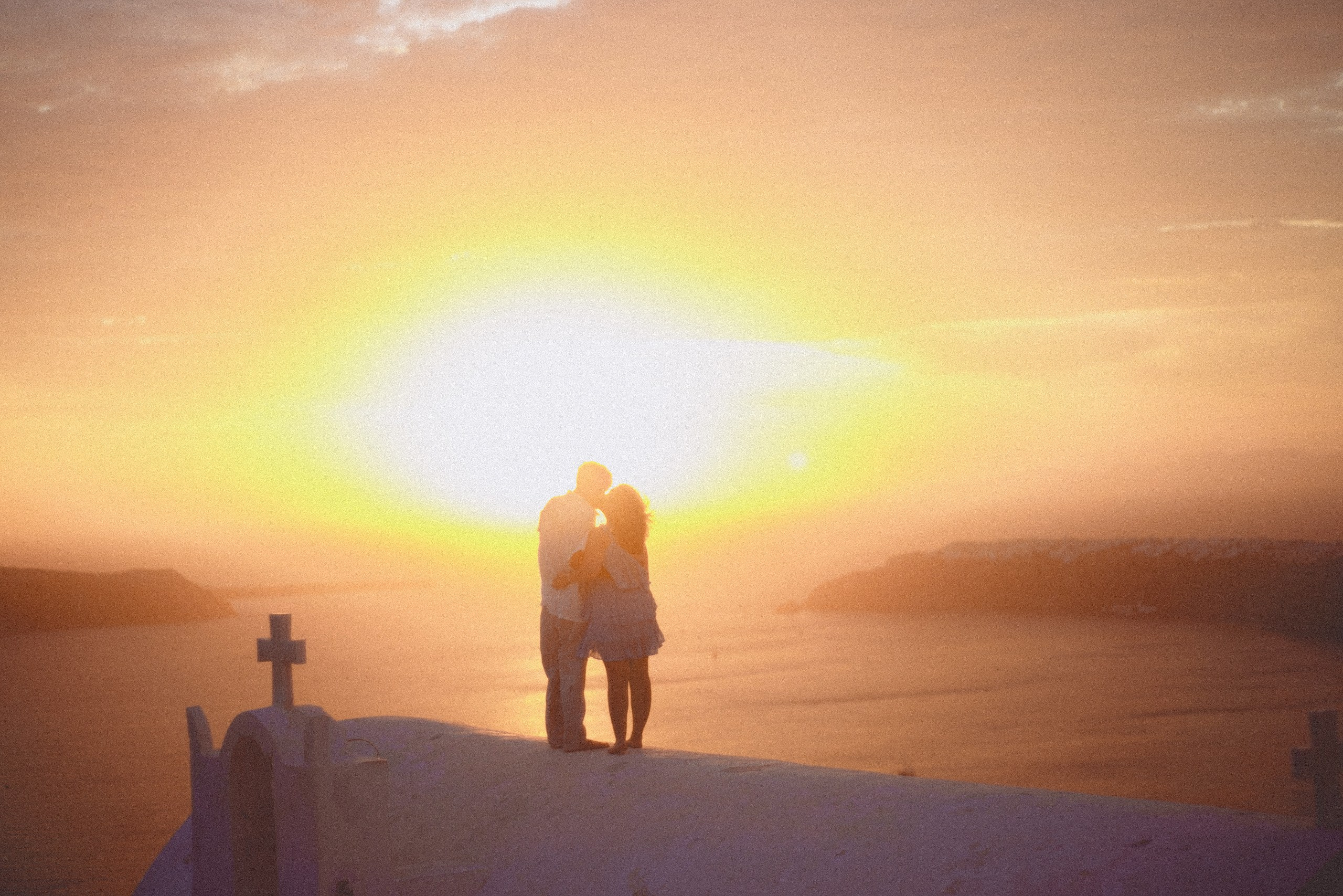 Couple sunset photoshoot in Santorini. Photographer in Greece Kristina