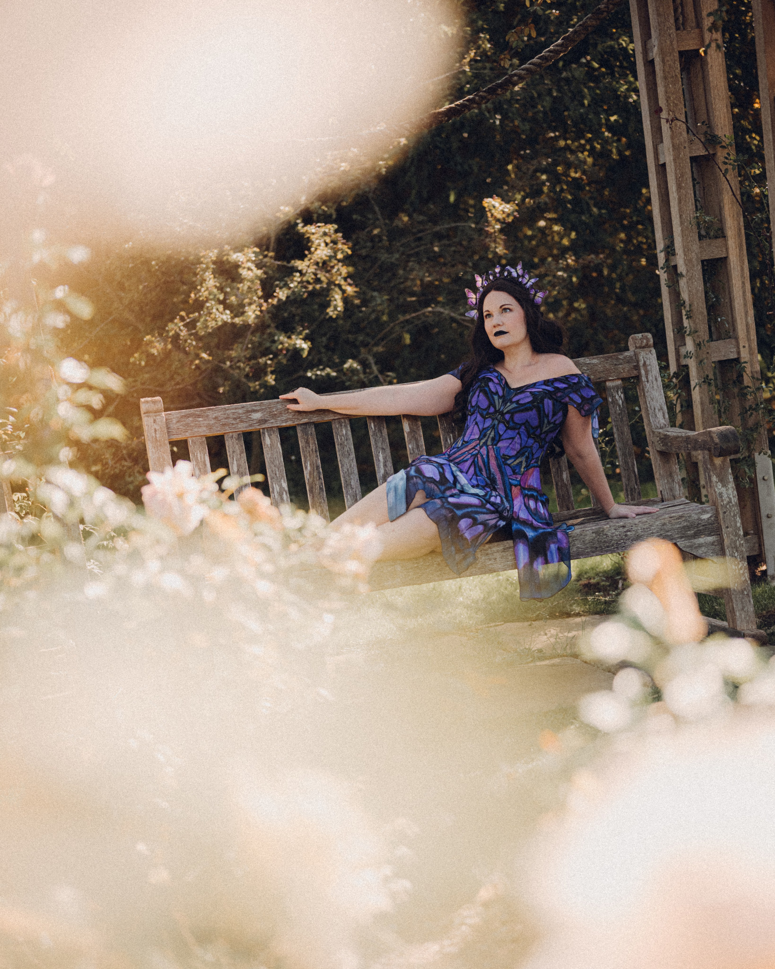 Butterfly purple fairy in a blooming garden. Moth & Moss Photography