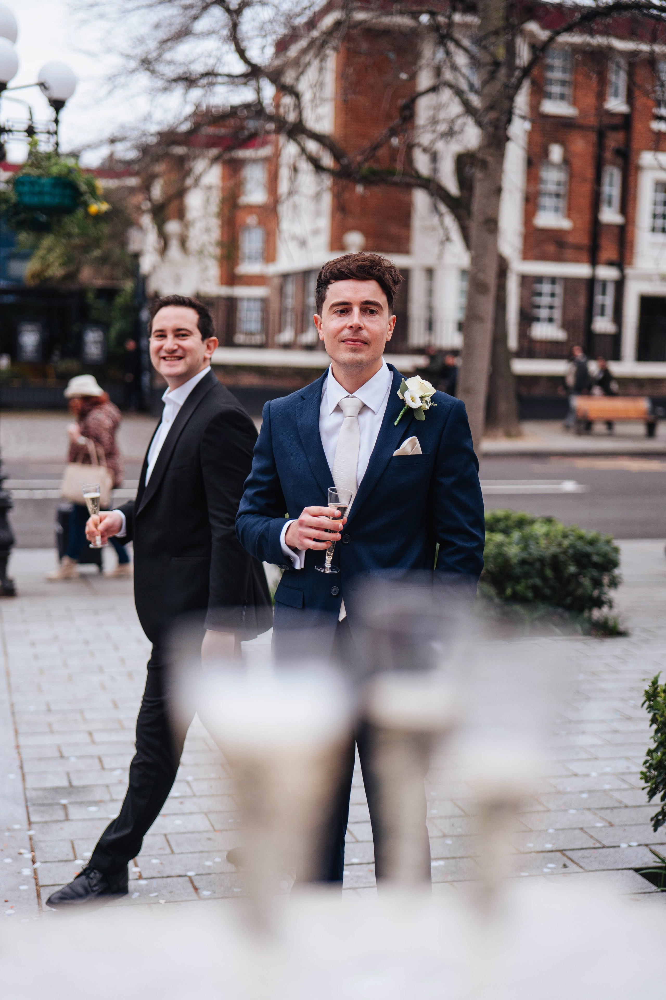 Exit from Islington town hall, champagne bottle opening 