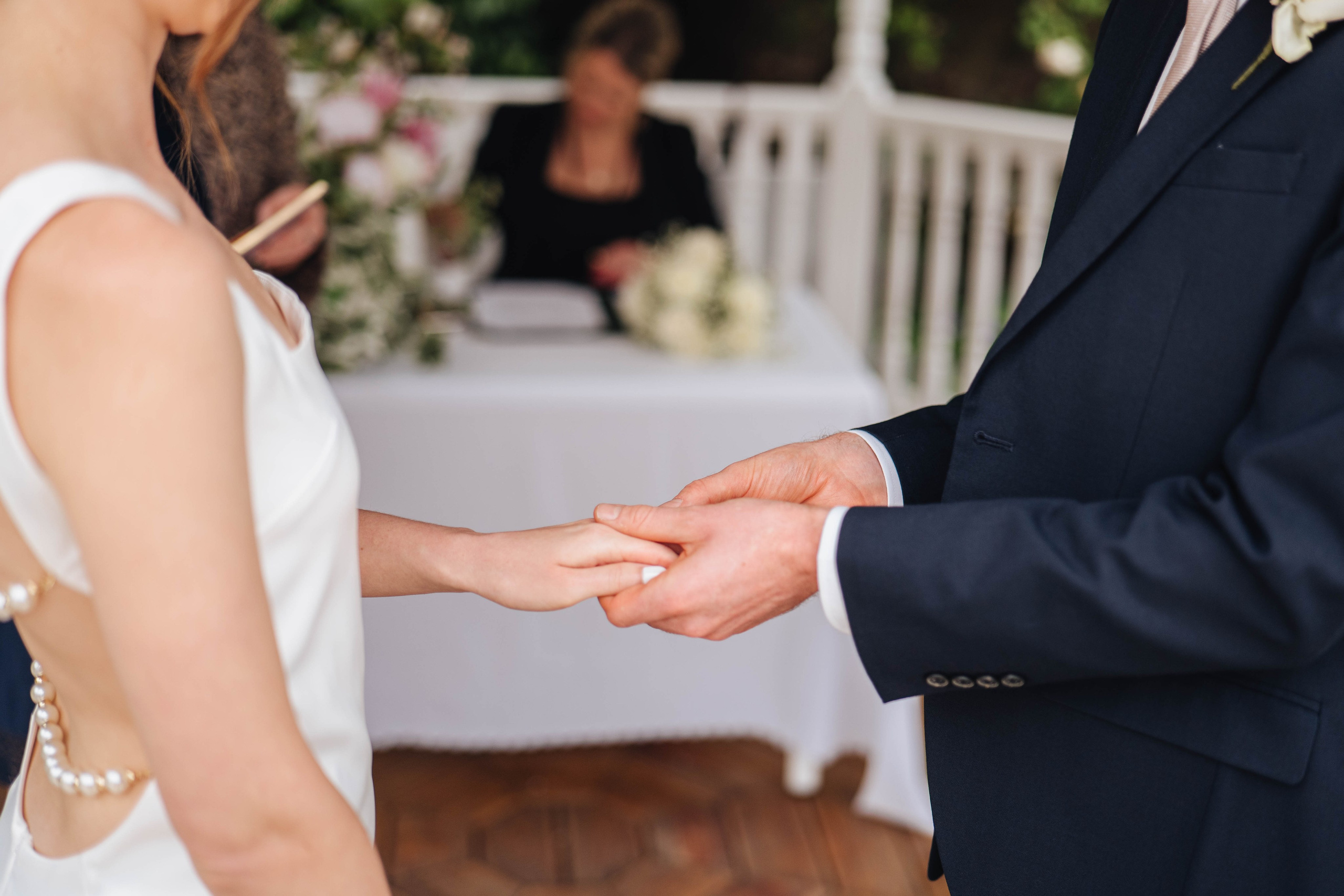 bride and groom at the ceremony, changing rings