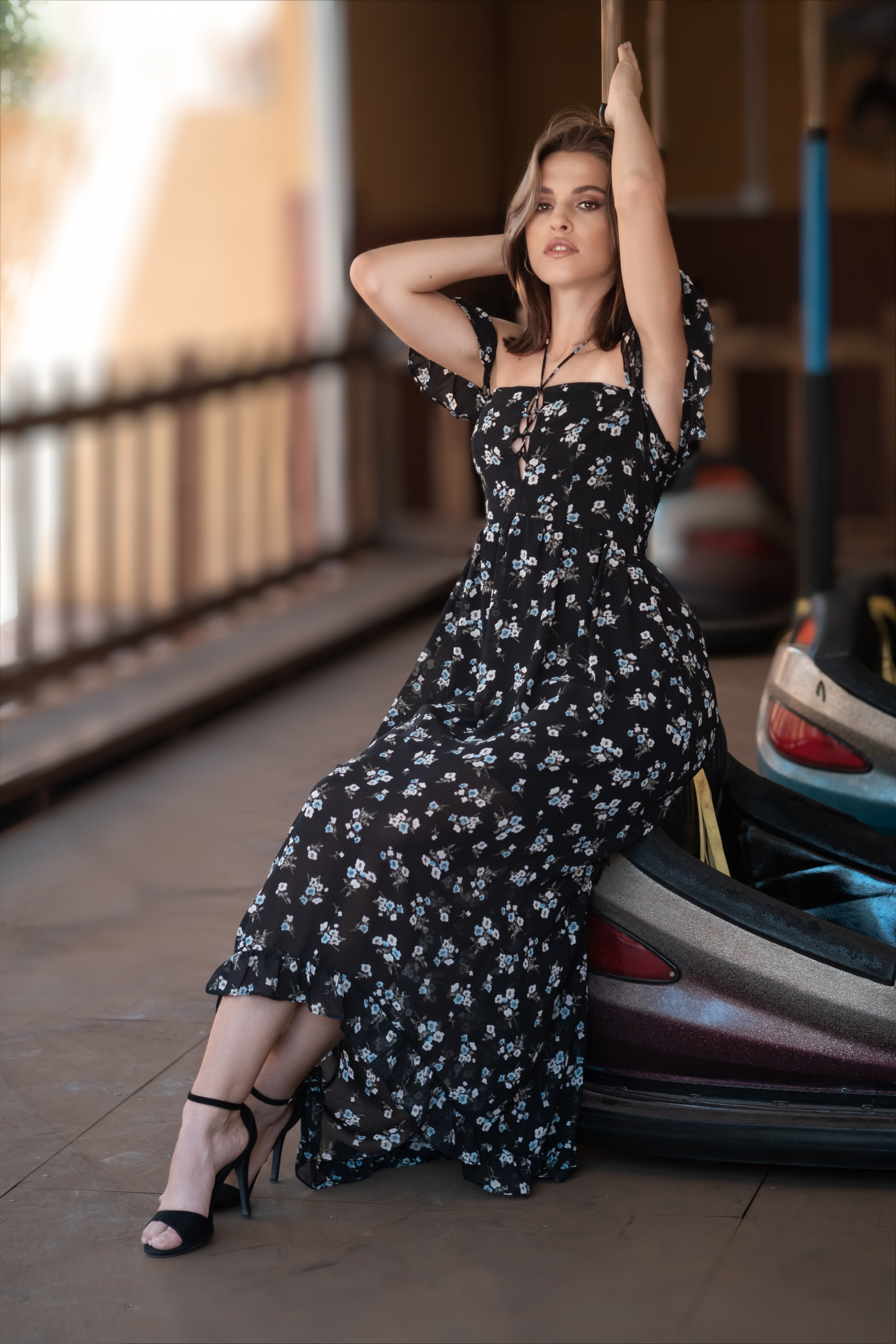 model in black summer dress