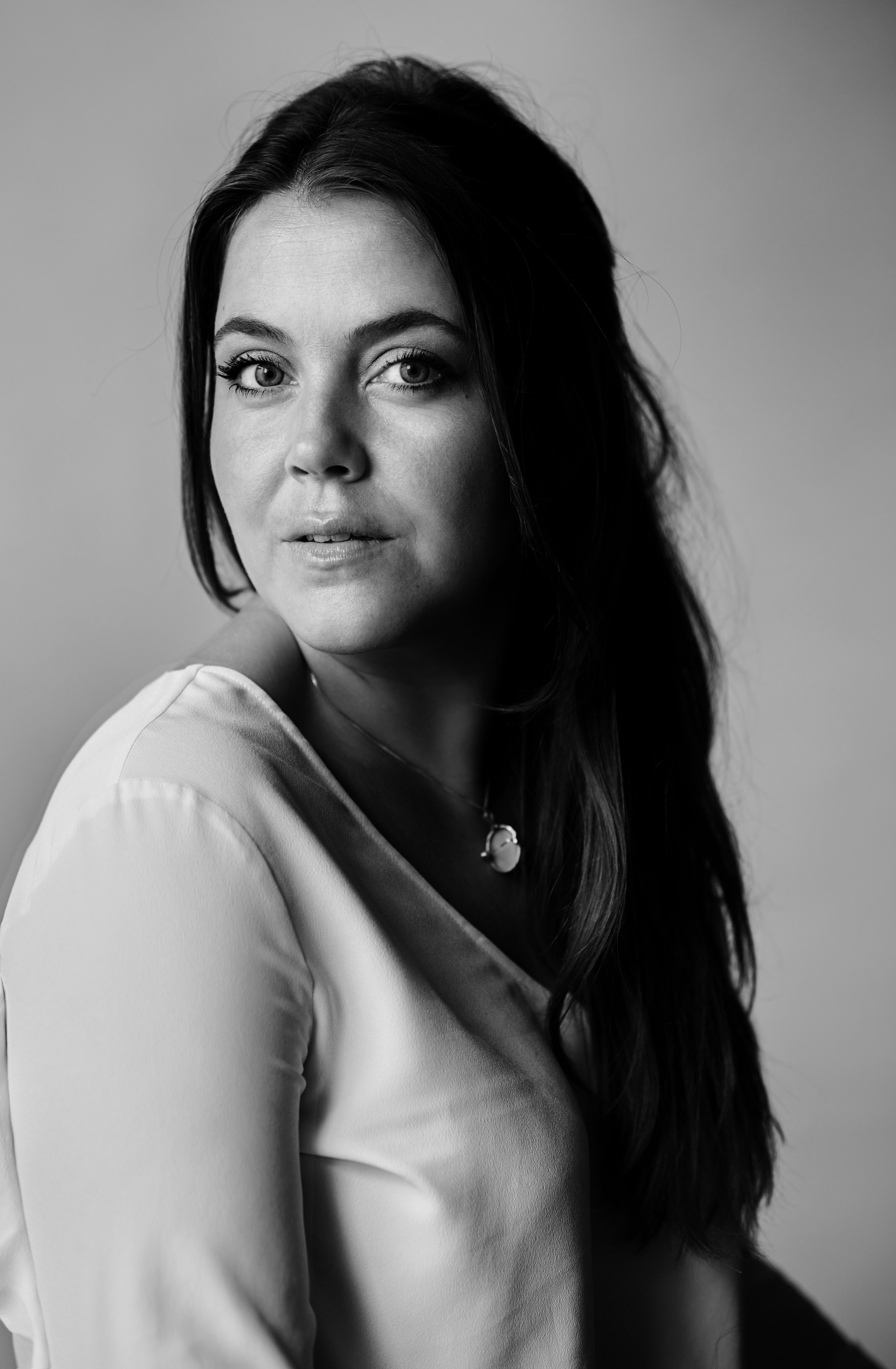 Woman photographer in Amsterdam, black and white portrait by Victoria Ushkanova