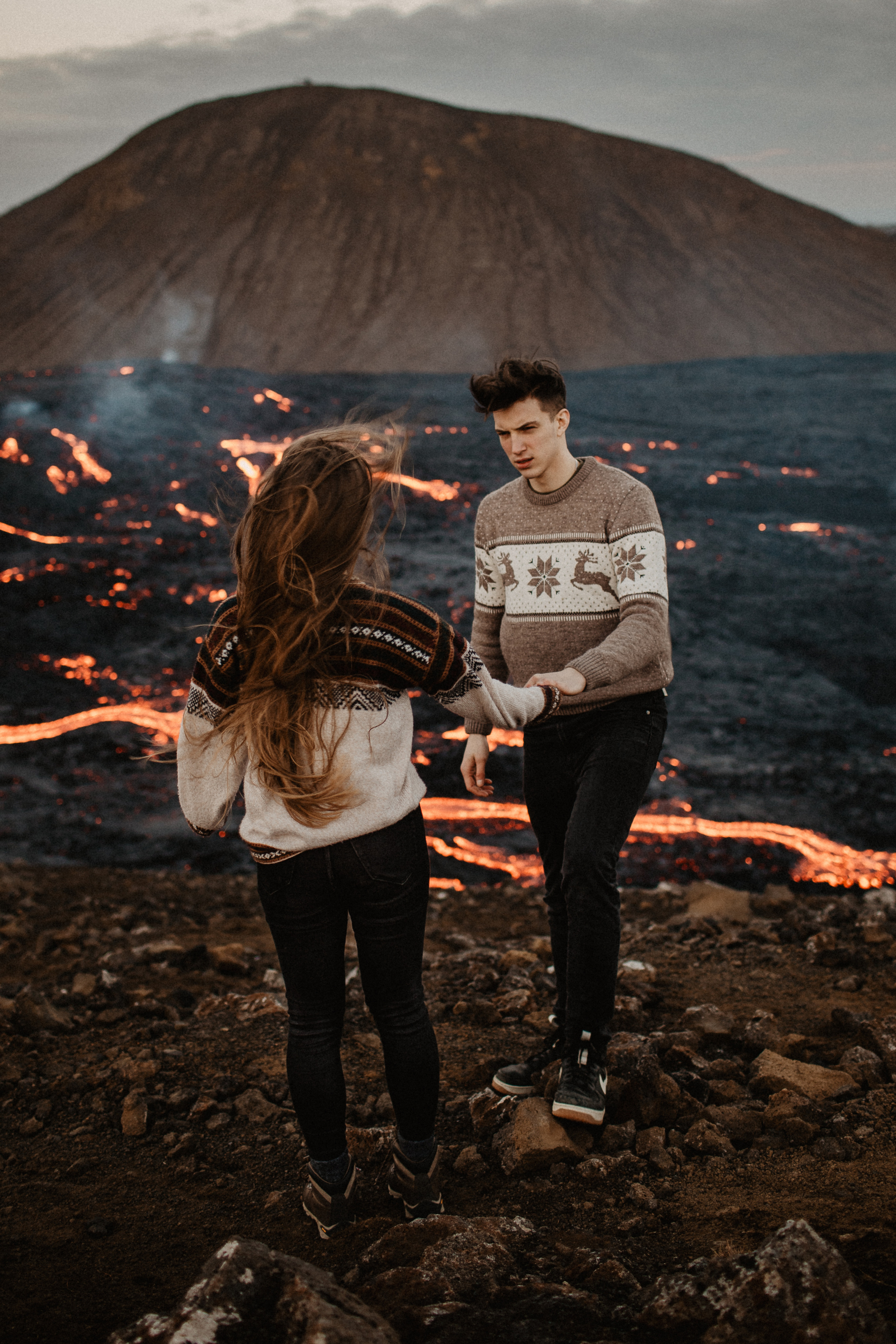 Couple photoshoot in front of volcano eruption in Iceland. Iceland elopement photo and video | Nikolaichik Photo