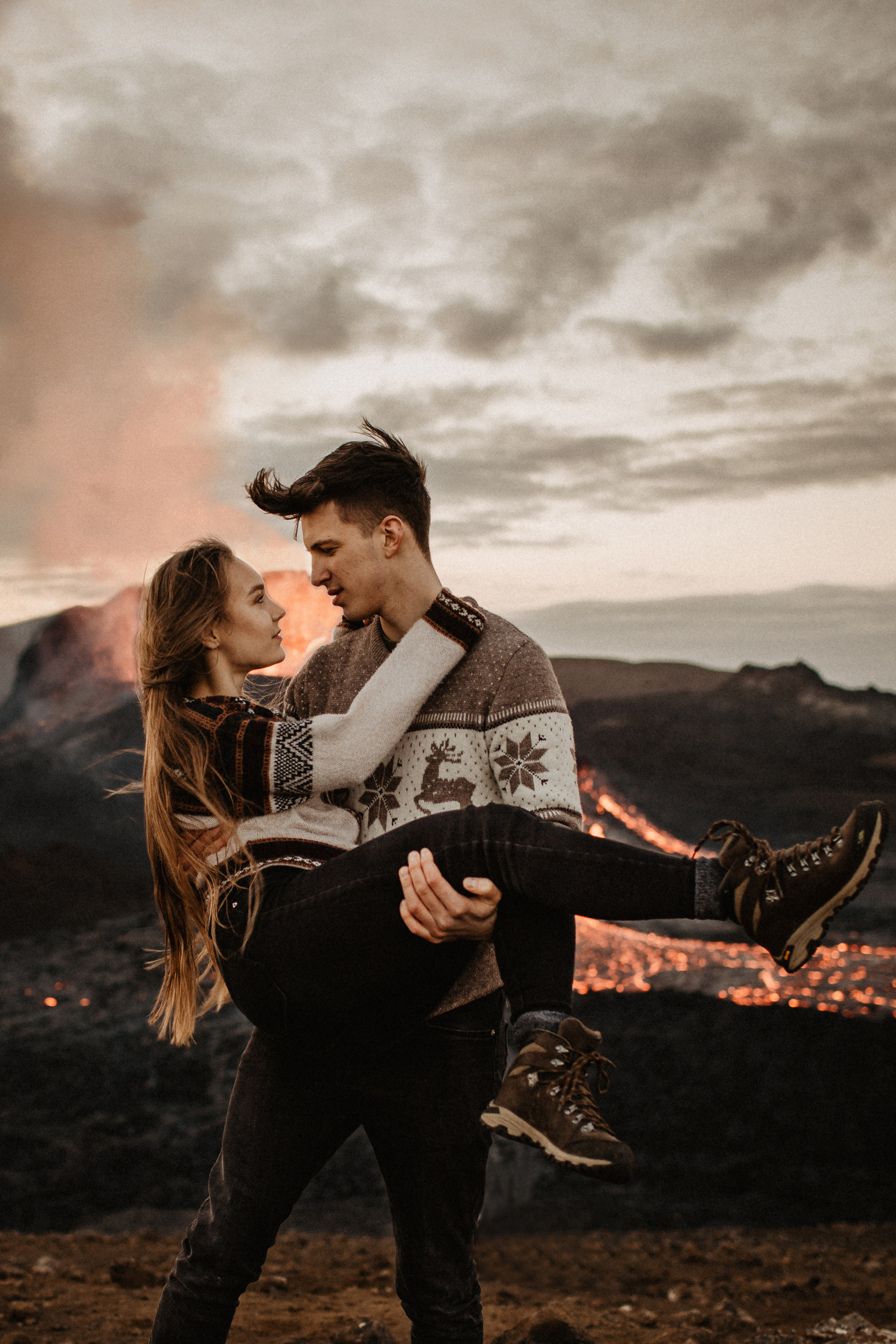 Couple photoshoot in front of volcano eruption in Iceland. Iceland elopement photo and video | Nikolaichik Photo
