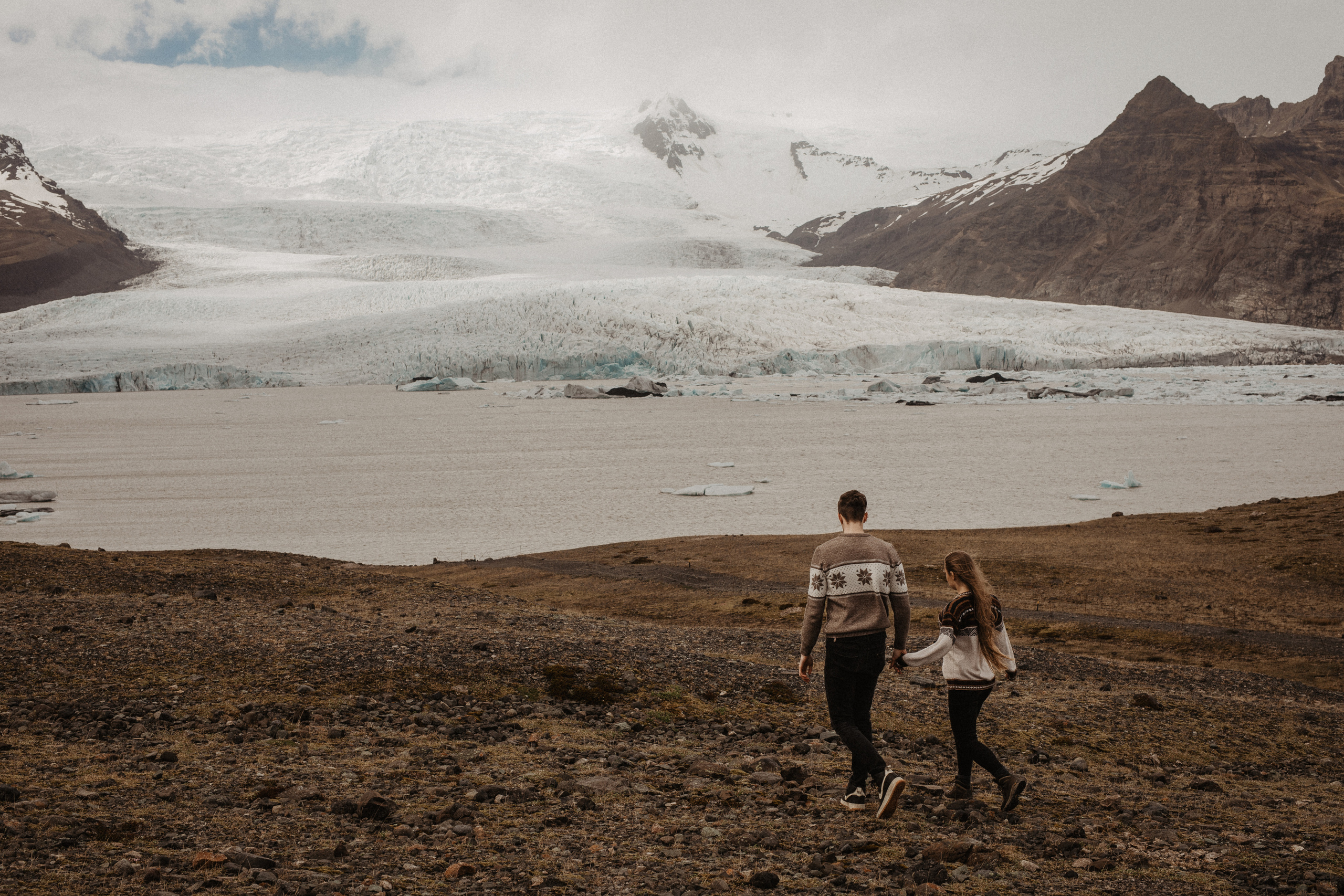 Couple photoshoot in front of volcano eruption in Iceland. Iceland elopement photo and video | Nikolaichik Photo
