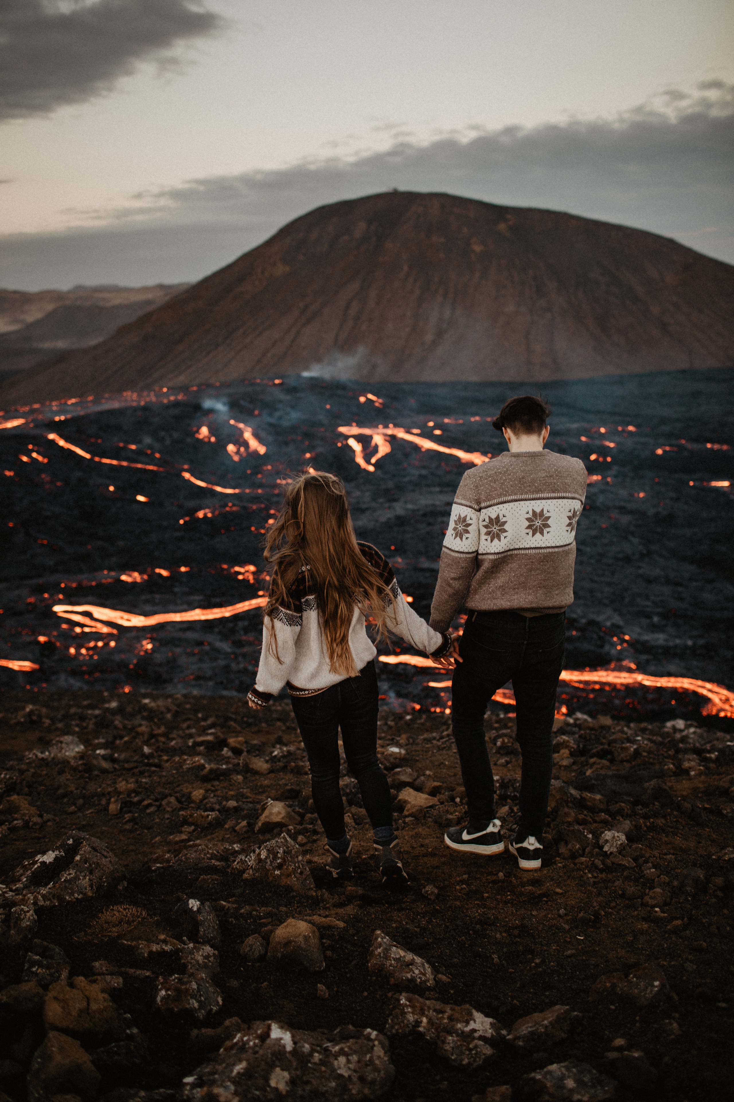 Couple photoshoot in front of volcano eruption in Iceland. Iceland elopement photo and video | Nikolaichik Photo