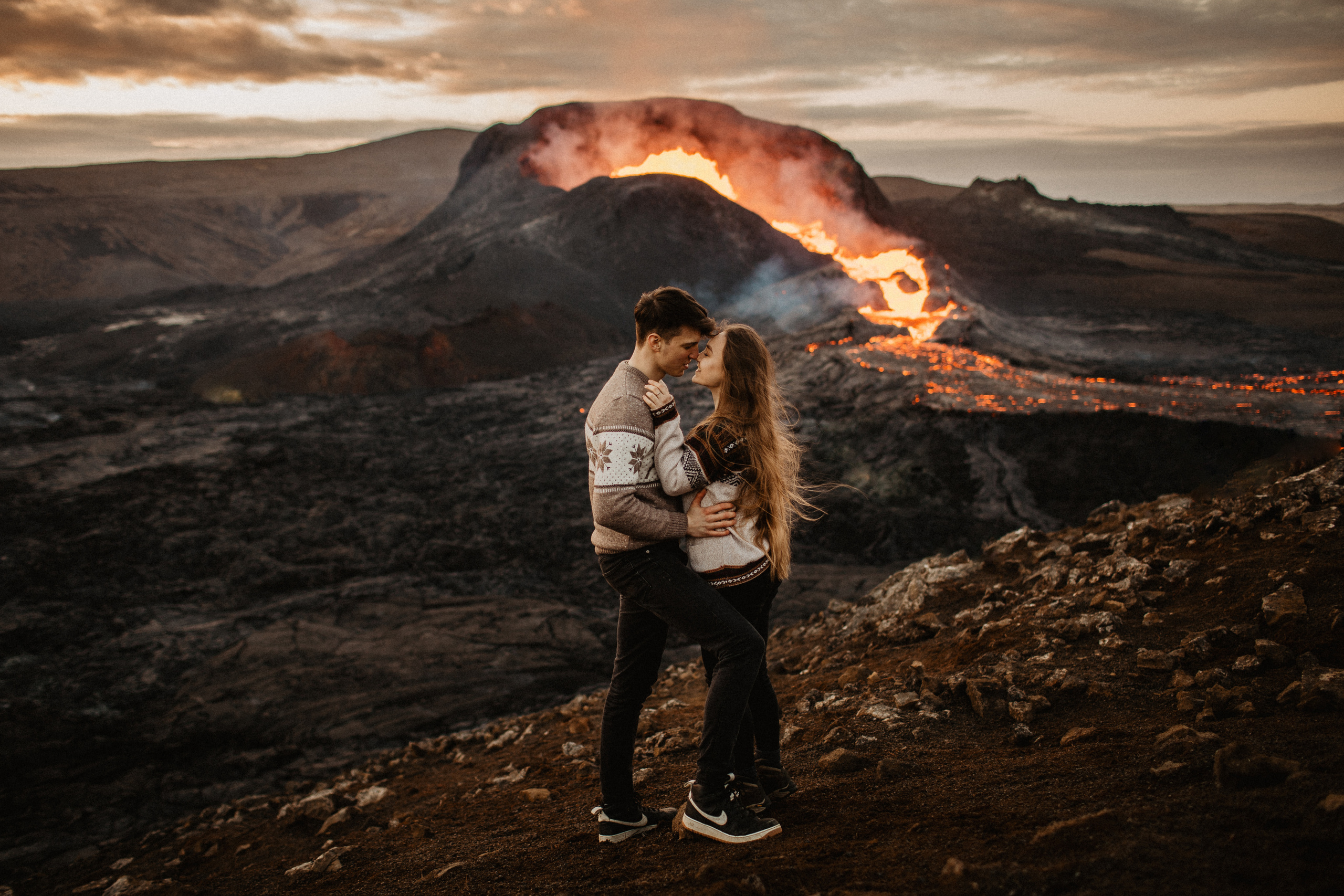 Couple photoshoot in front of volcano eruption in Iceland. Iceland elopement photo and video | Nikolaichik Photo