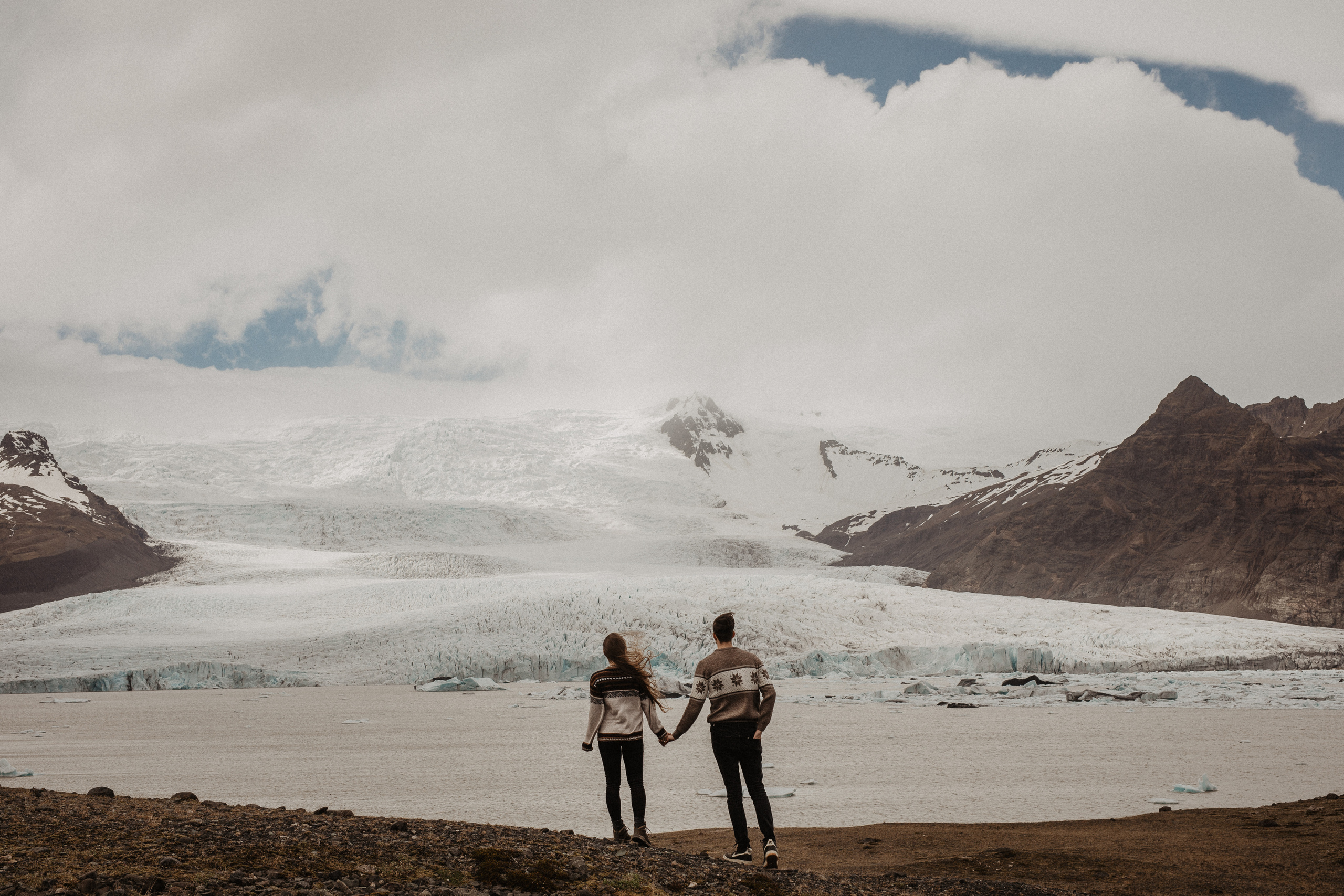 Couple photoshoot in front of volcano eruption in Iceland. Iceland elopement photo and video | Nikolaichik Photo