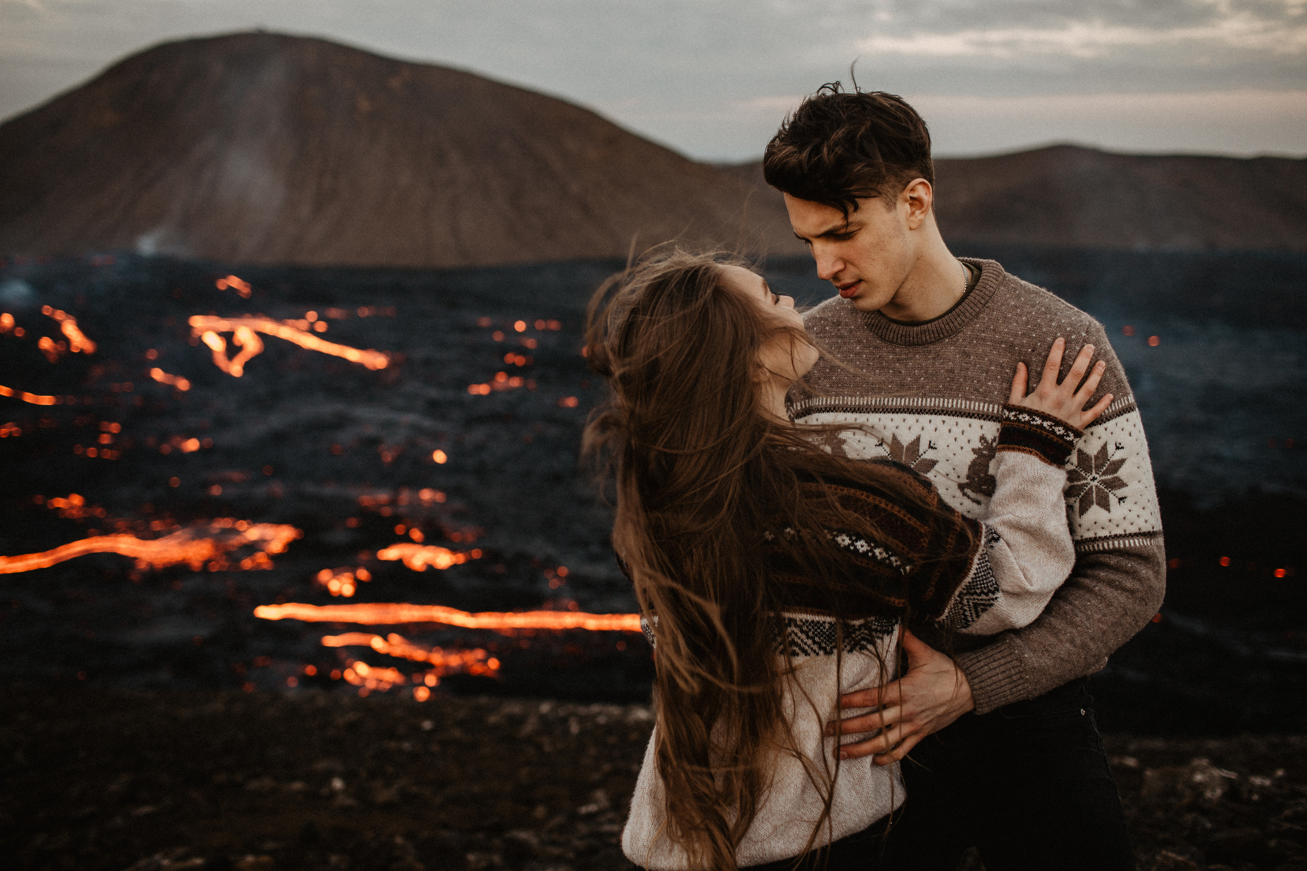 Couple photoshoot in front of volcano eruption in Iceland. Iceland elopement photo and video | Nikolaichik Photo