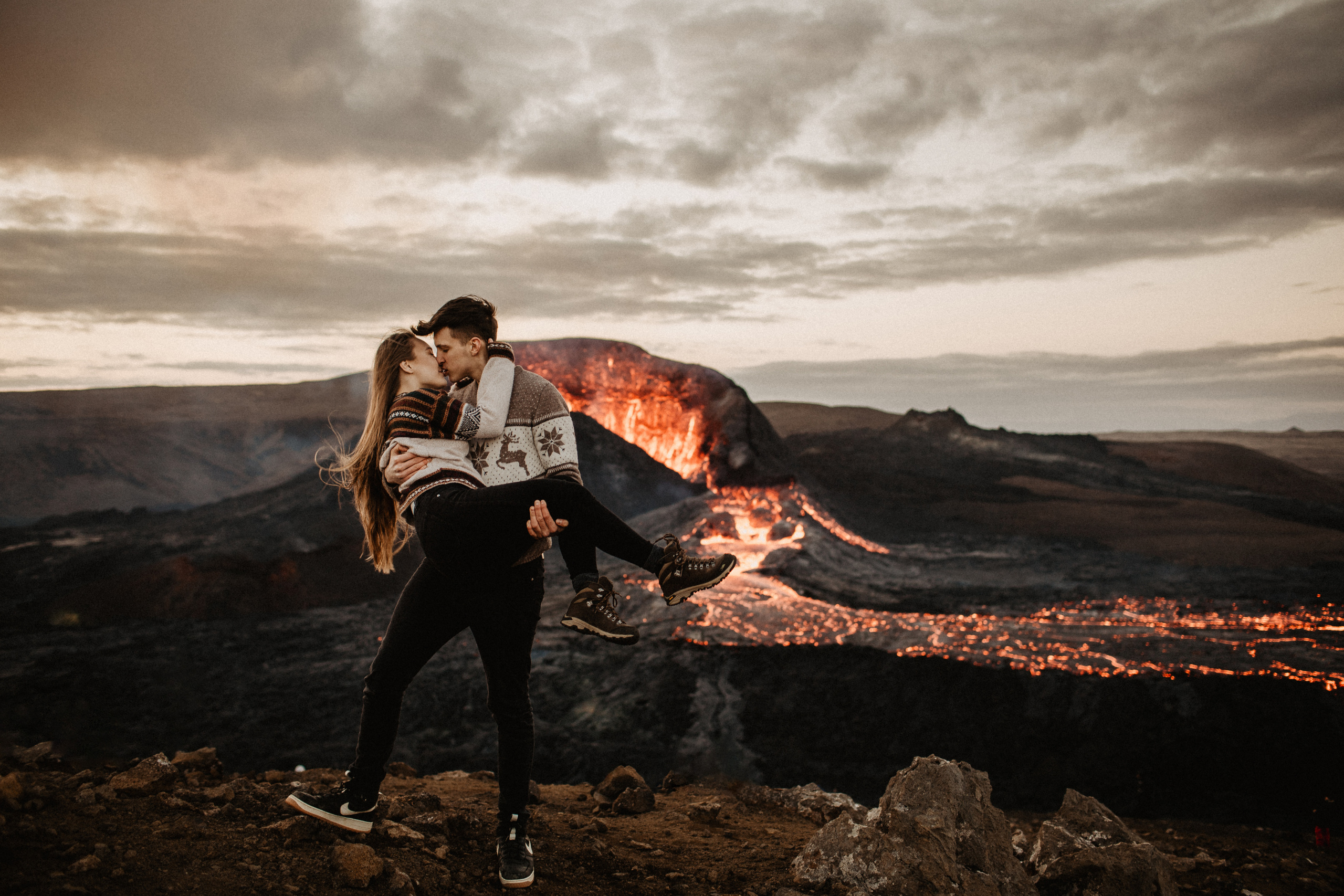 Couple photoshoot in front of volcano eruption in Iceland. Iceland elopement photo and video | Nikolaichik Photo