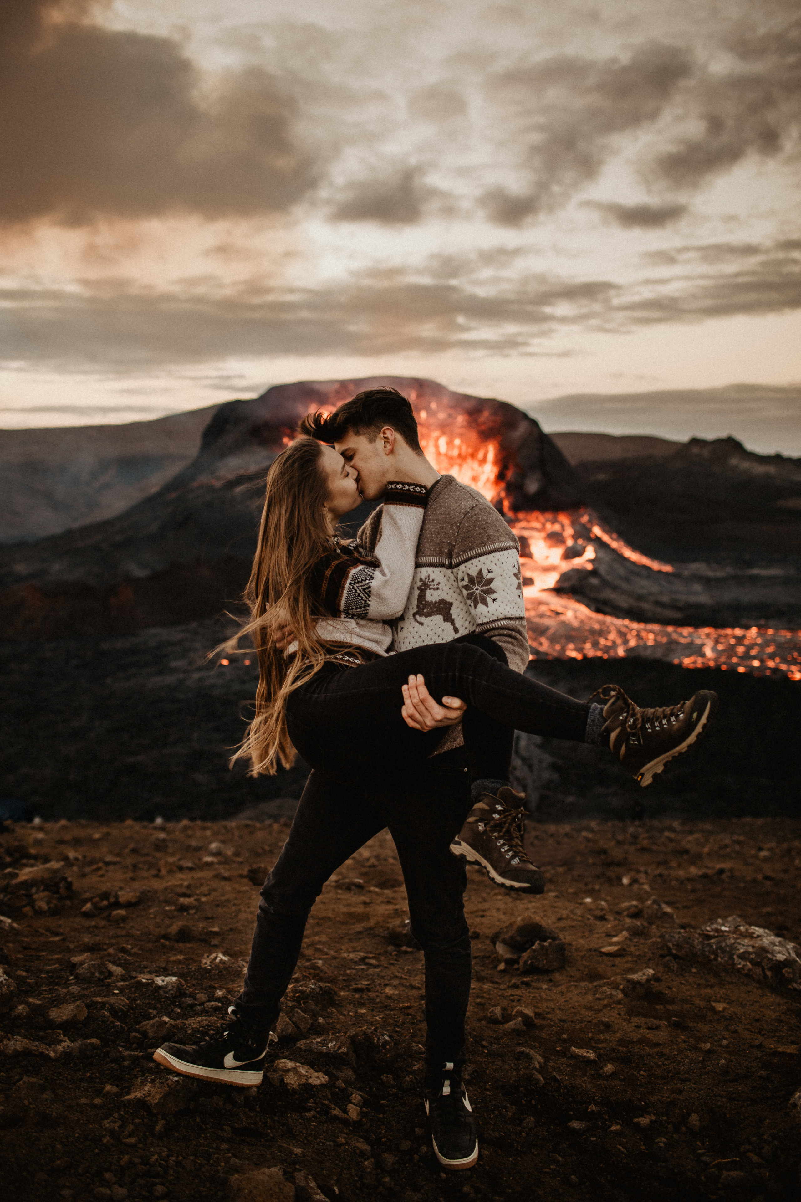 Couple photoshoot in front of volcano eruption in Iceland. Iceland elopement photo and video | Nikolaichik Photo