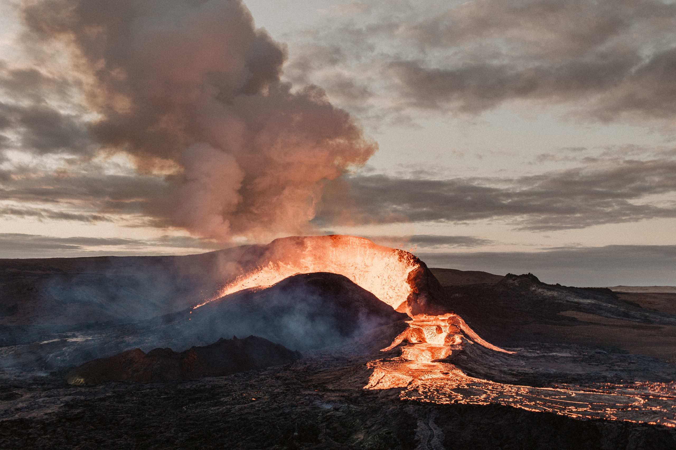 Couple photoshoot in front of volcano eruption in Iceland. Iceland elopement photo and video | Nikolaichik Photo