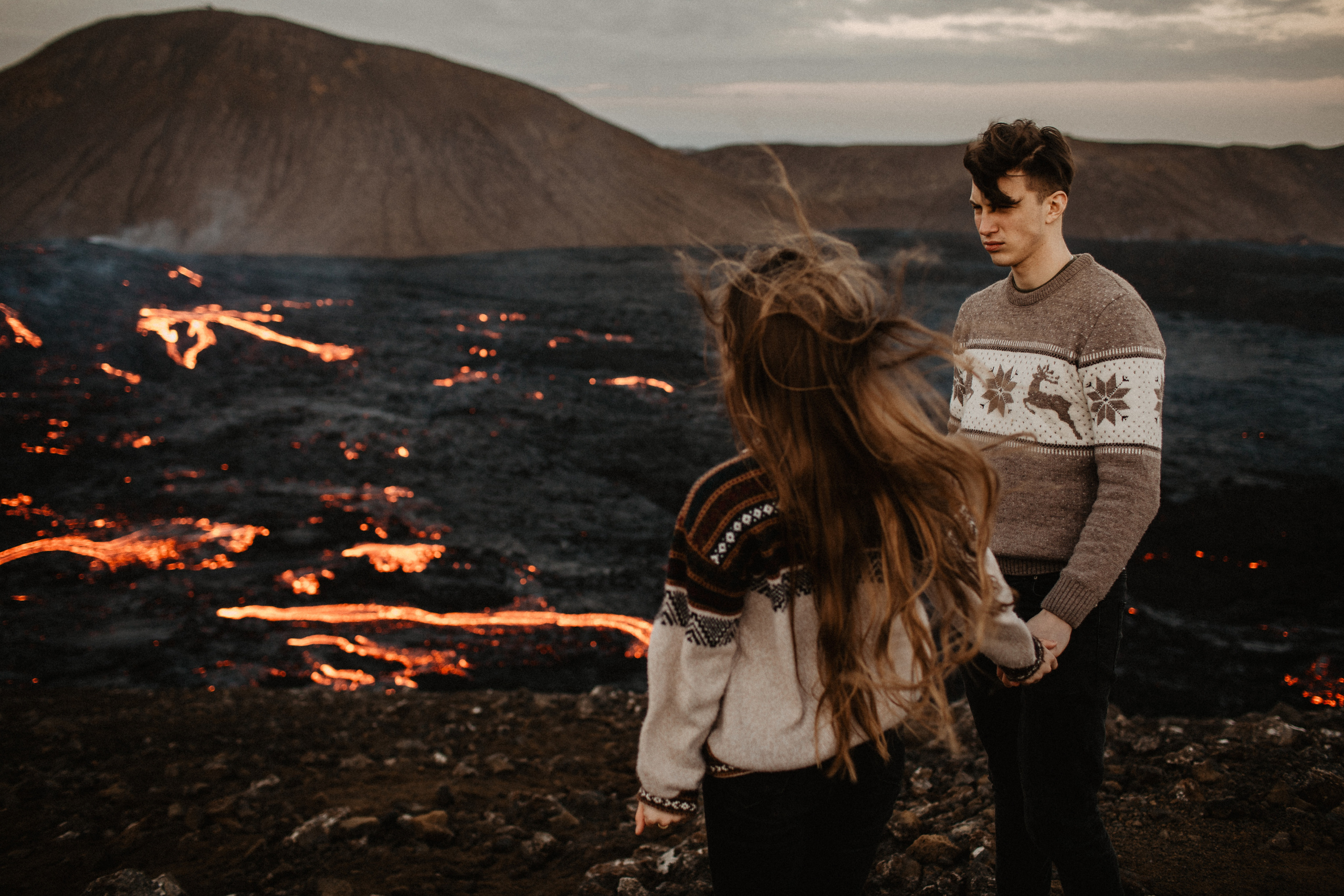 Couple photoshoot in front of volcano eruption in Iceland. Iceland elopement photo and video | Nikolaichik Photo