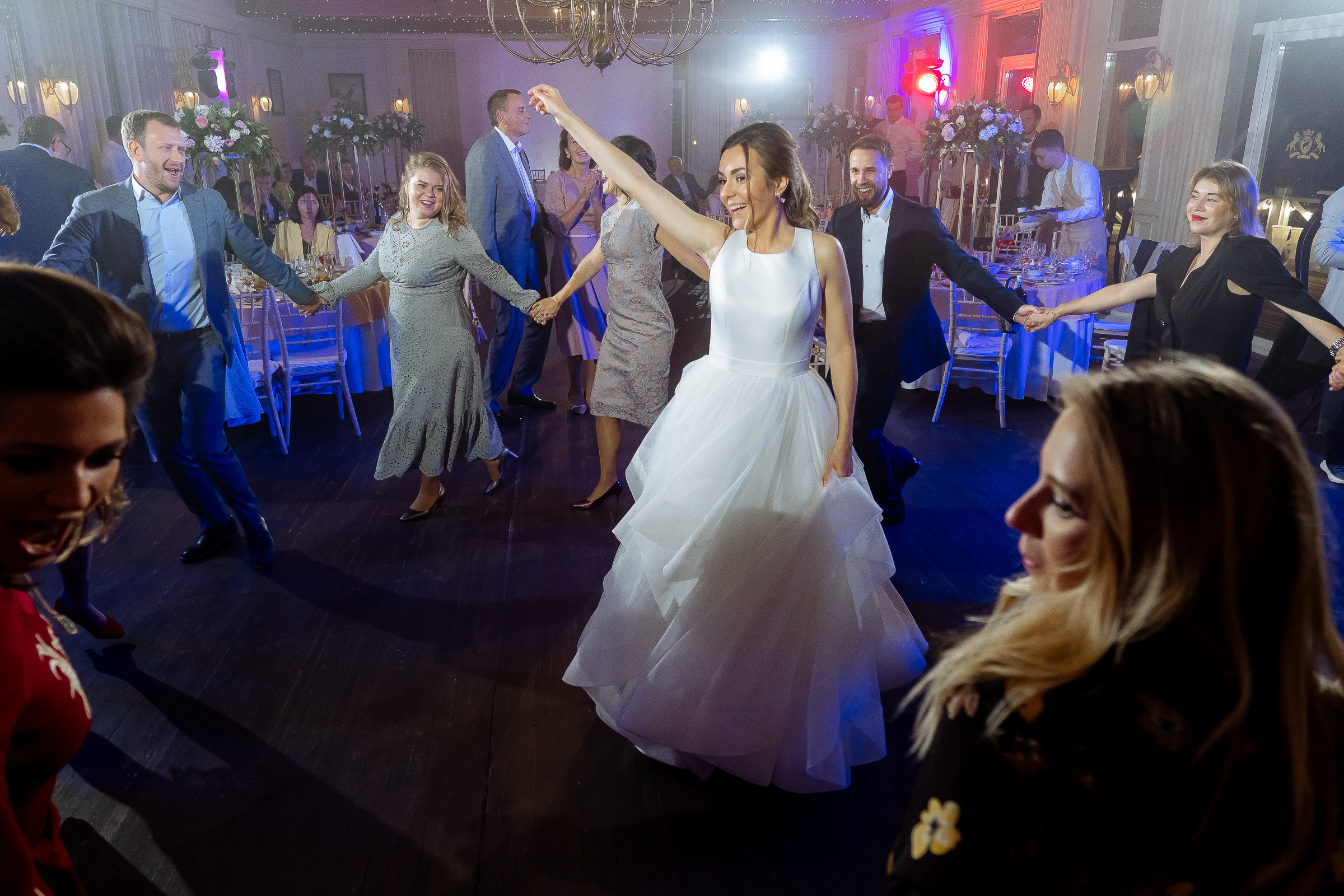Bride on dance floor, by Tanya Bodgan, Cornwall wedding photography.
