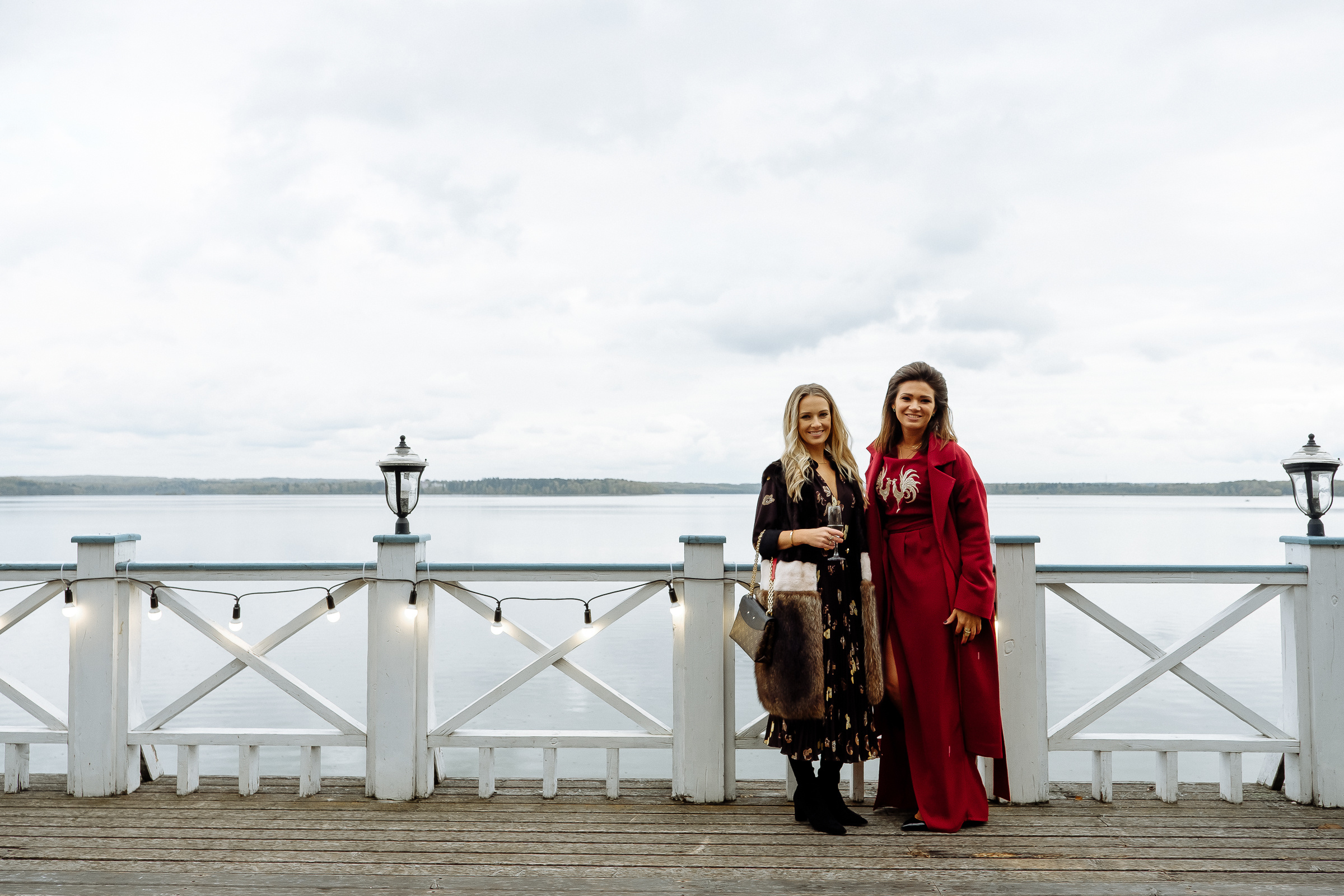 Guests on riverboat deck, by Tanya Bodgan, Bude wedding photography.  