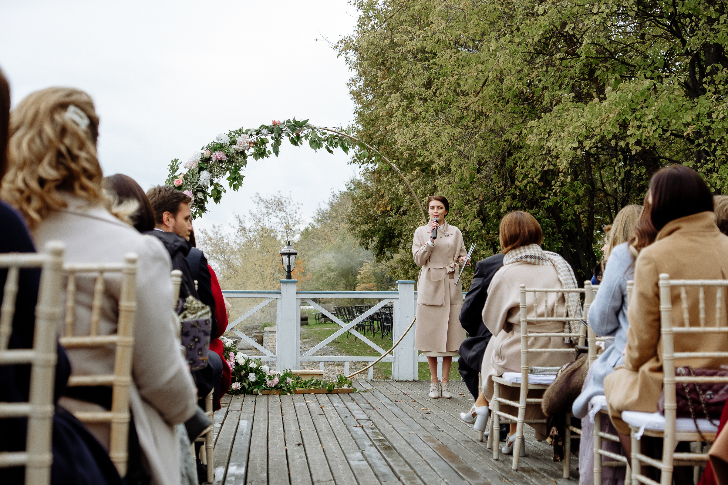 Guests at ceremony on riverboat deck, by Tanya Bodgan, Bude, Cornwall wedding photographer.  
