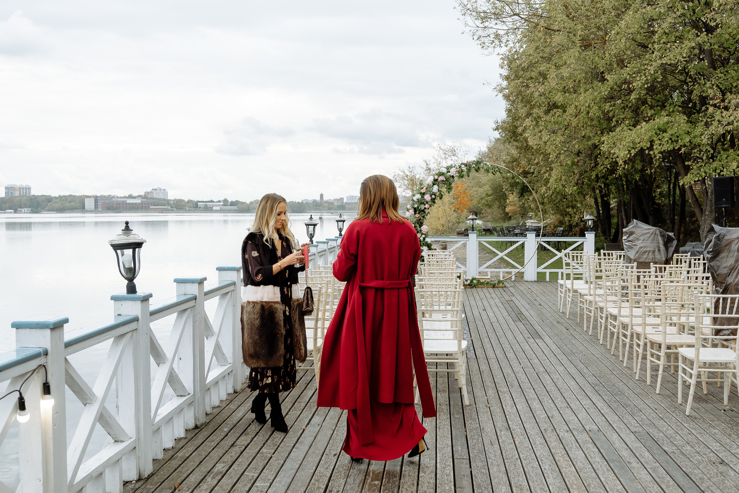 Guests on riverboat deck, by Tanya Bodgan, Newquay wedding photography.  