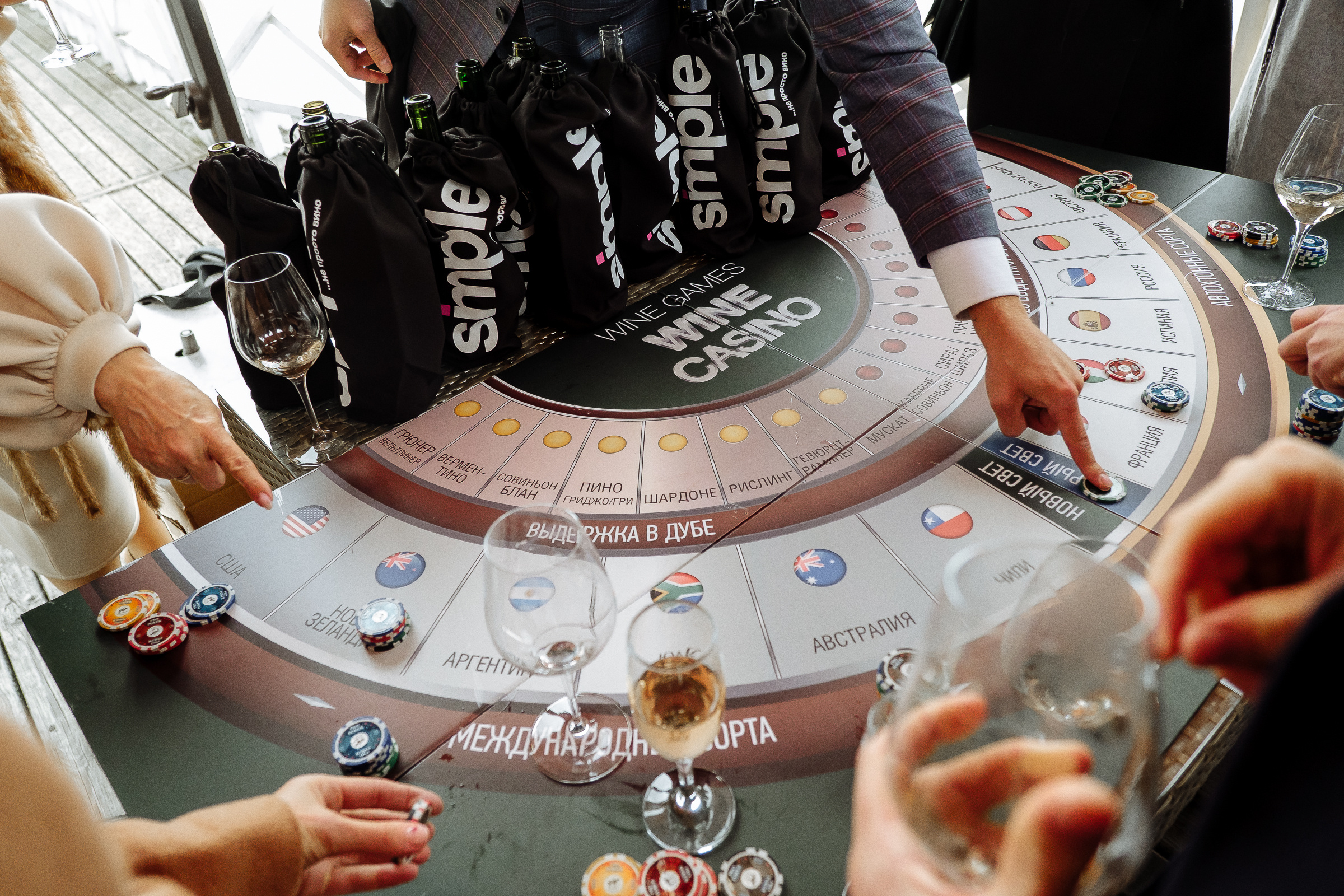 Guests gambling, by Tanya Bodgan, Bude wedding photography.  