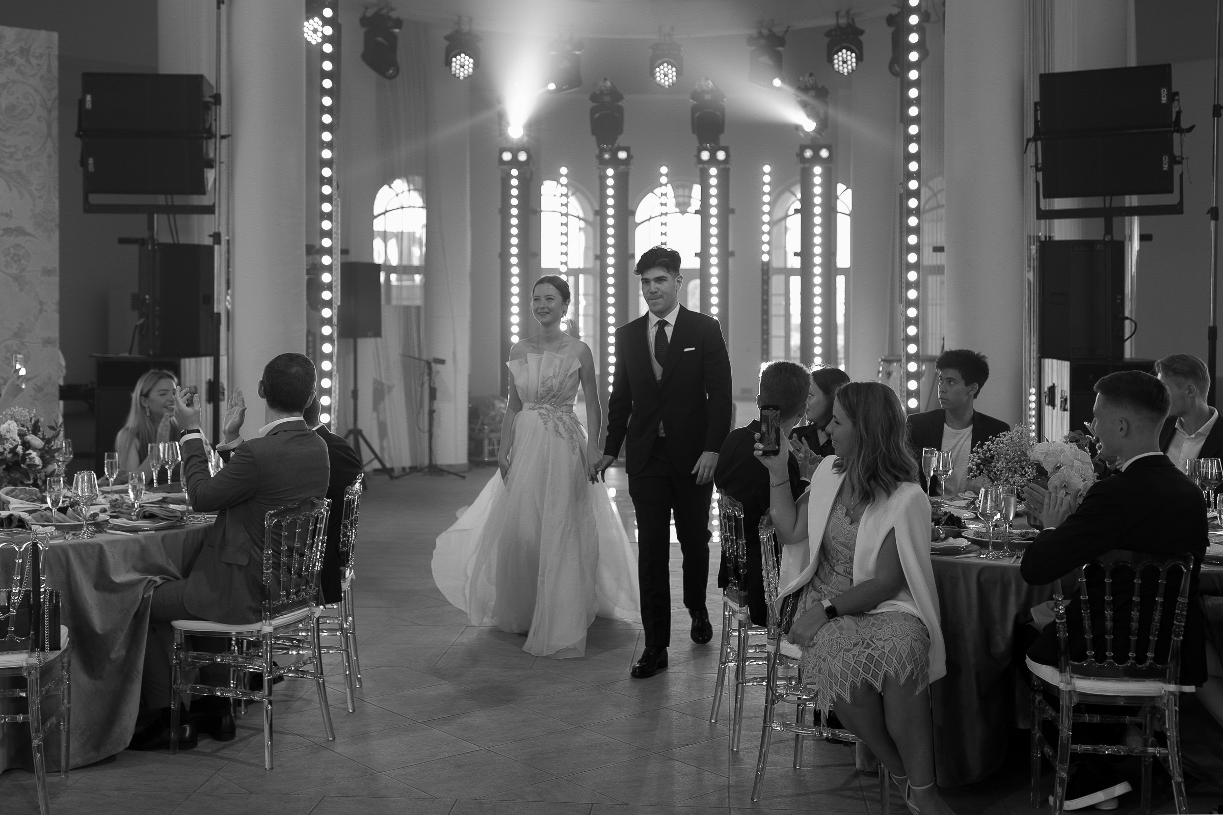 Couple’s reception entrance, by Cornwall reportage photographer.
