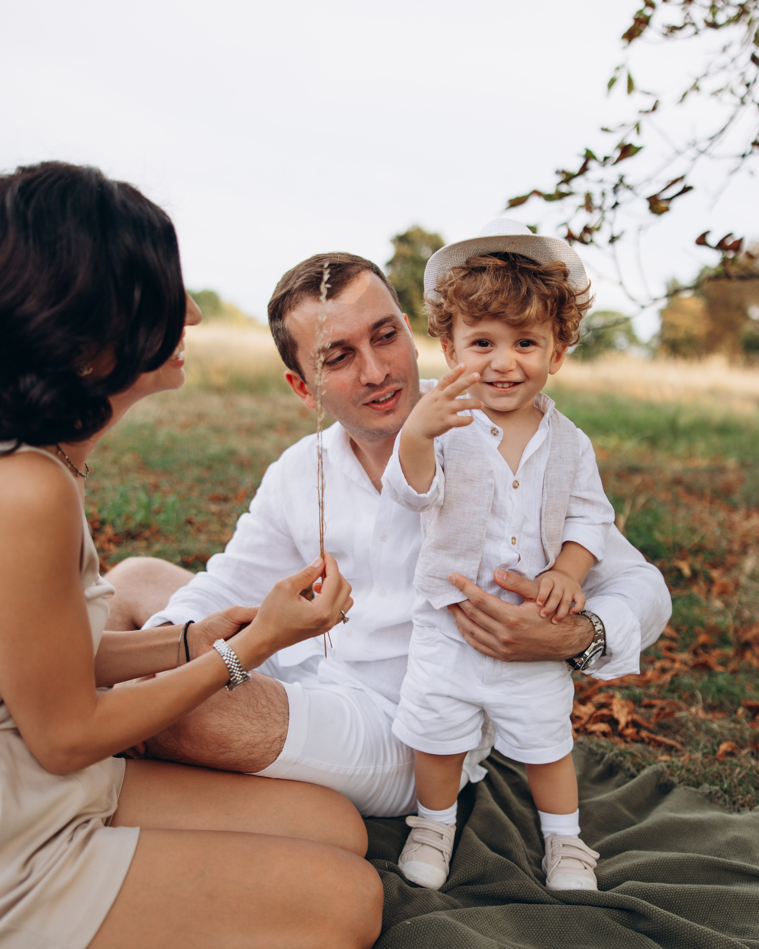 Valerik with parents (Hyde park). Anastasia Klink, Photographer in London
