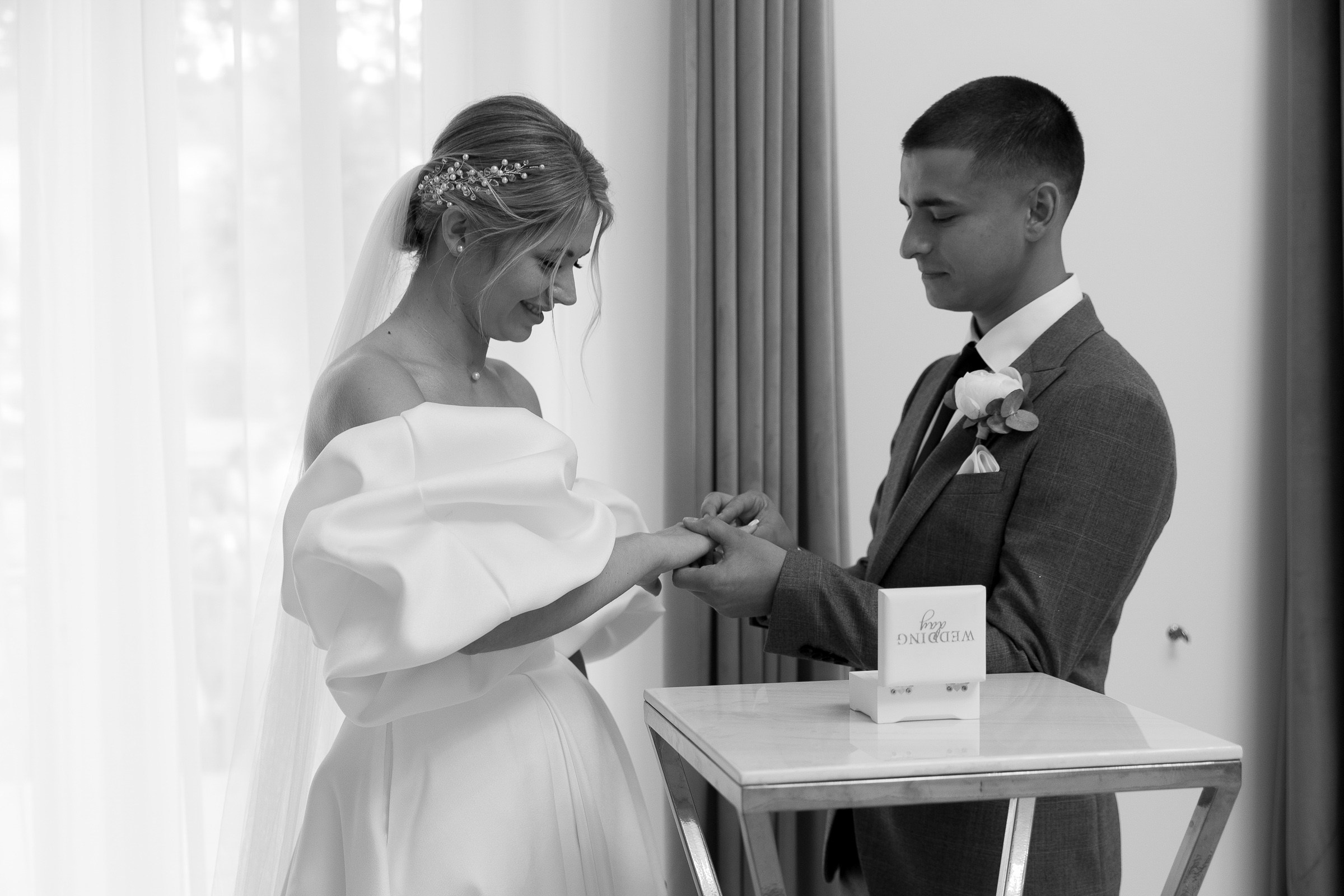 Ring exchange close-up, by Newquay wedding photographer.