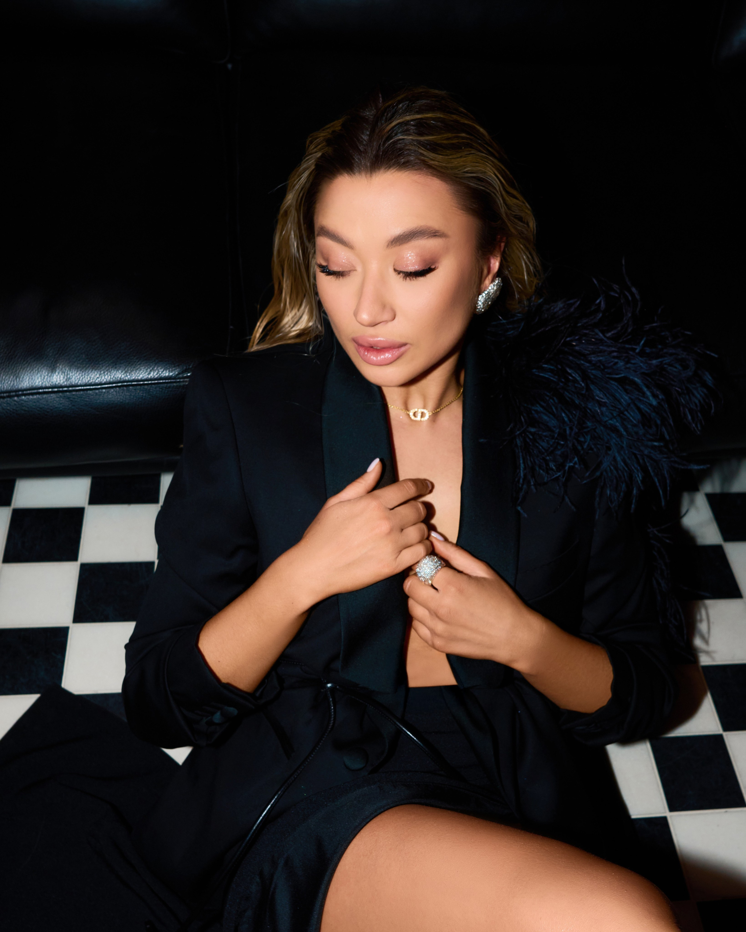 Stylish indoor photo of woman with elegant furniture in mansion interior