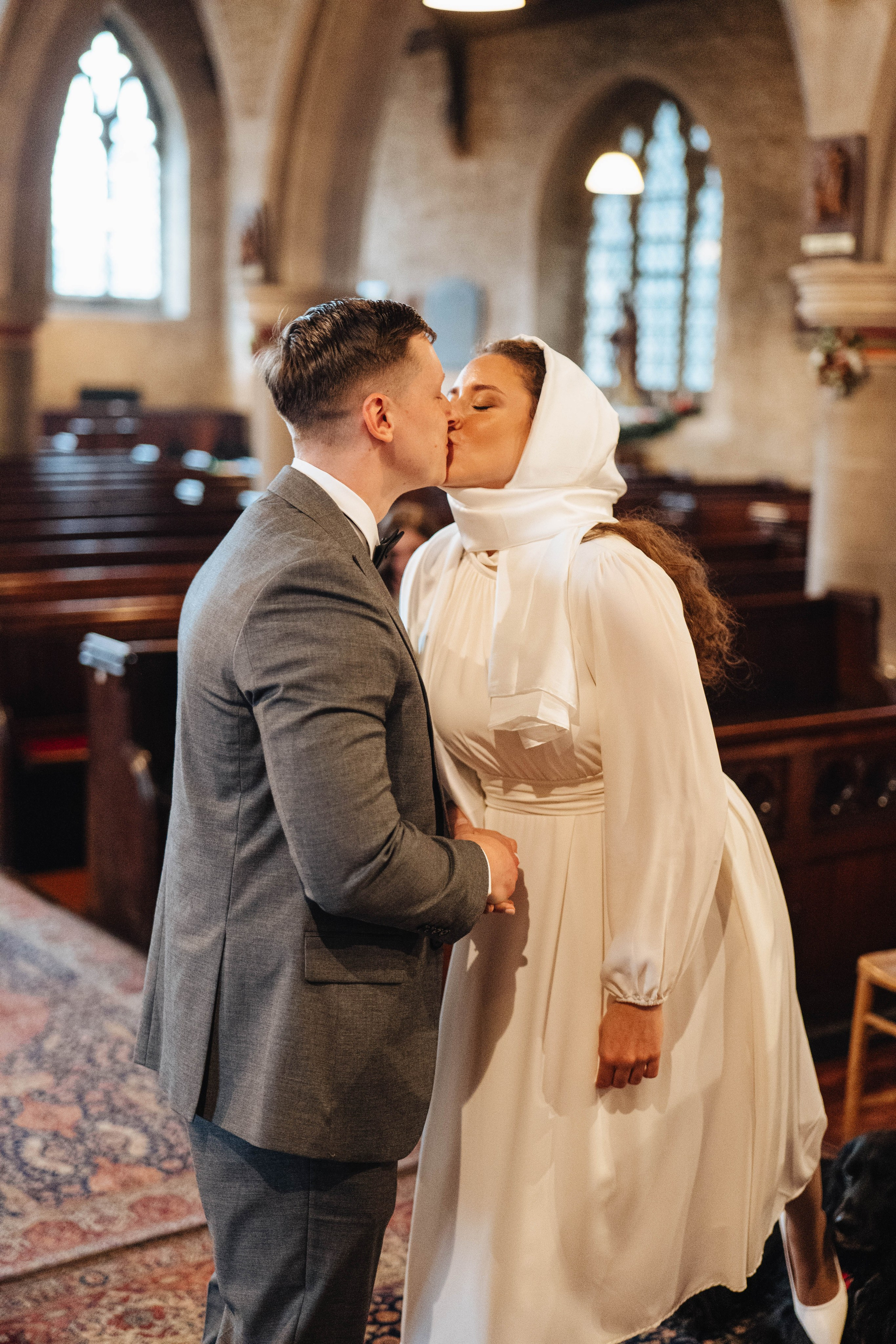 Part of wedding ceremony in church, kissing