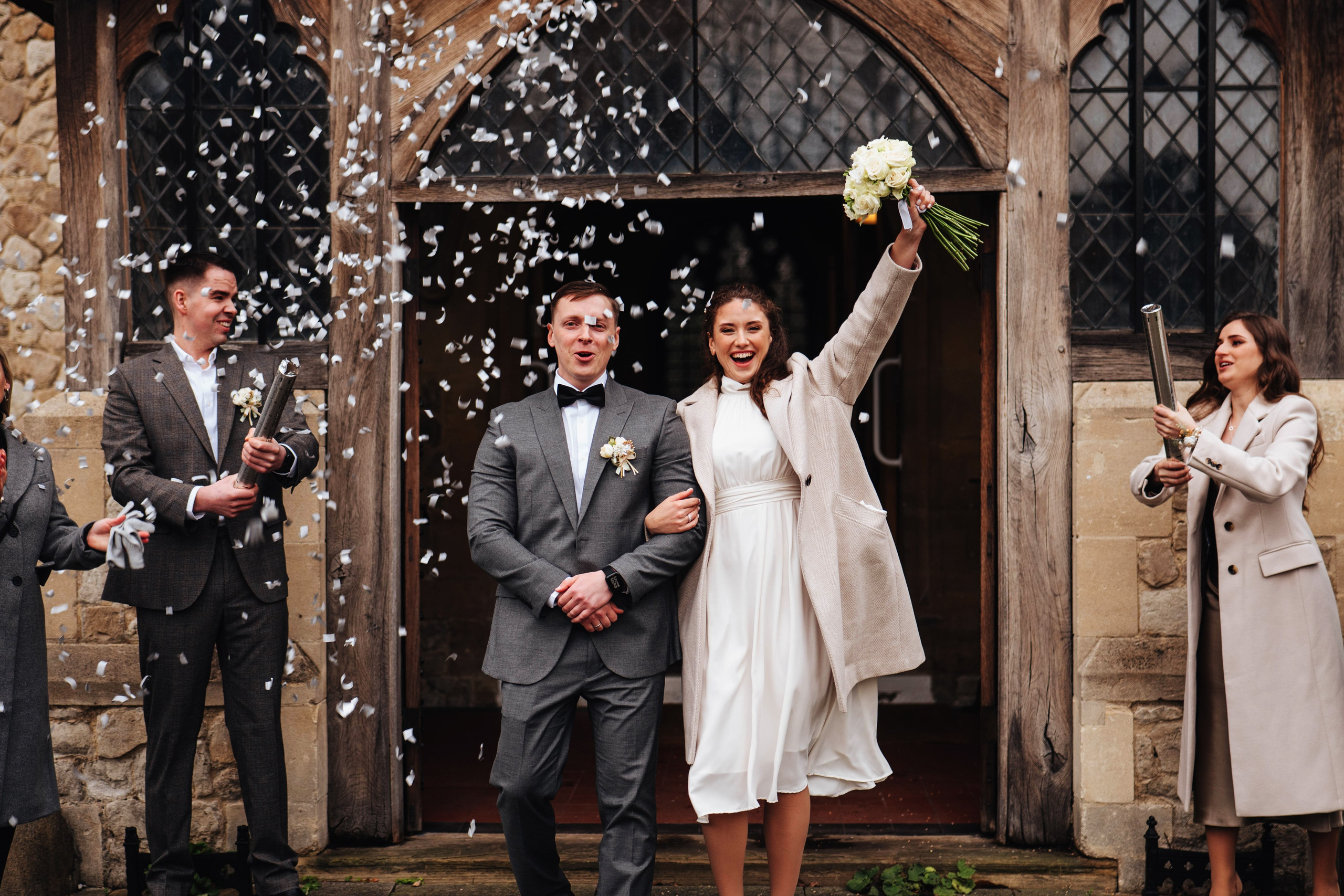 confetti at the exit from church after the wedding ceremony