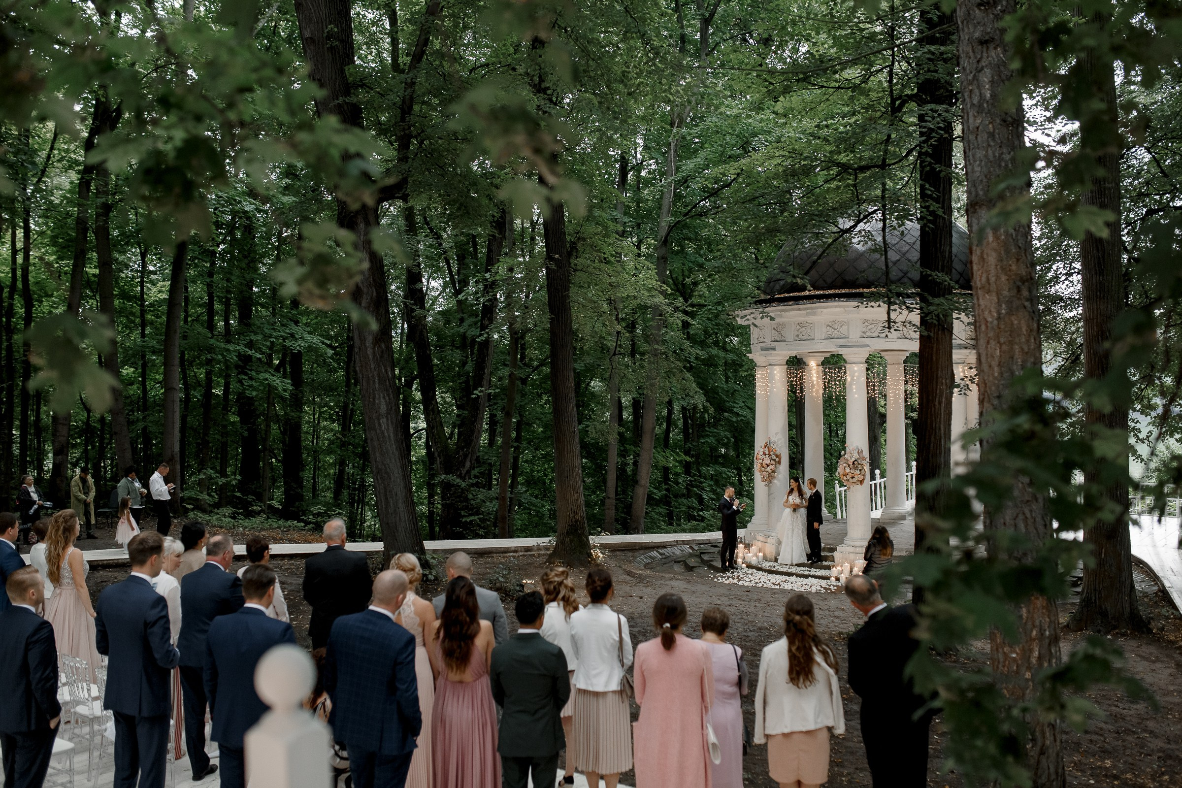 Guests at outdoor ceremony, by Bude, Cornwall wedding photographer.