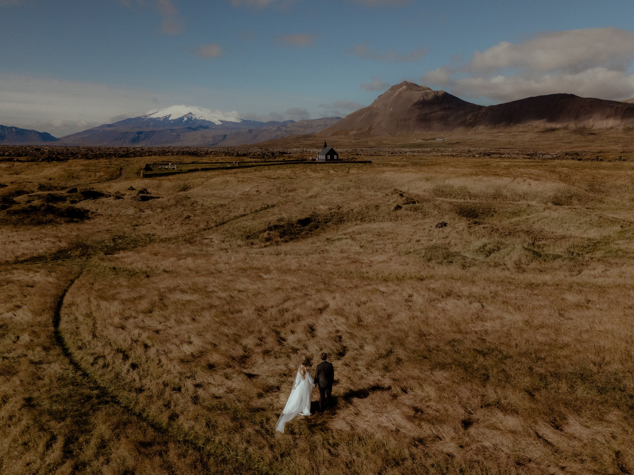 Iceland elopement at Budir Black Church | Snæfellsnes wedding by Iceland elopement photographer & videographer. Iceland elopement photographer & videographer
