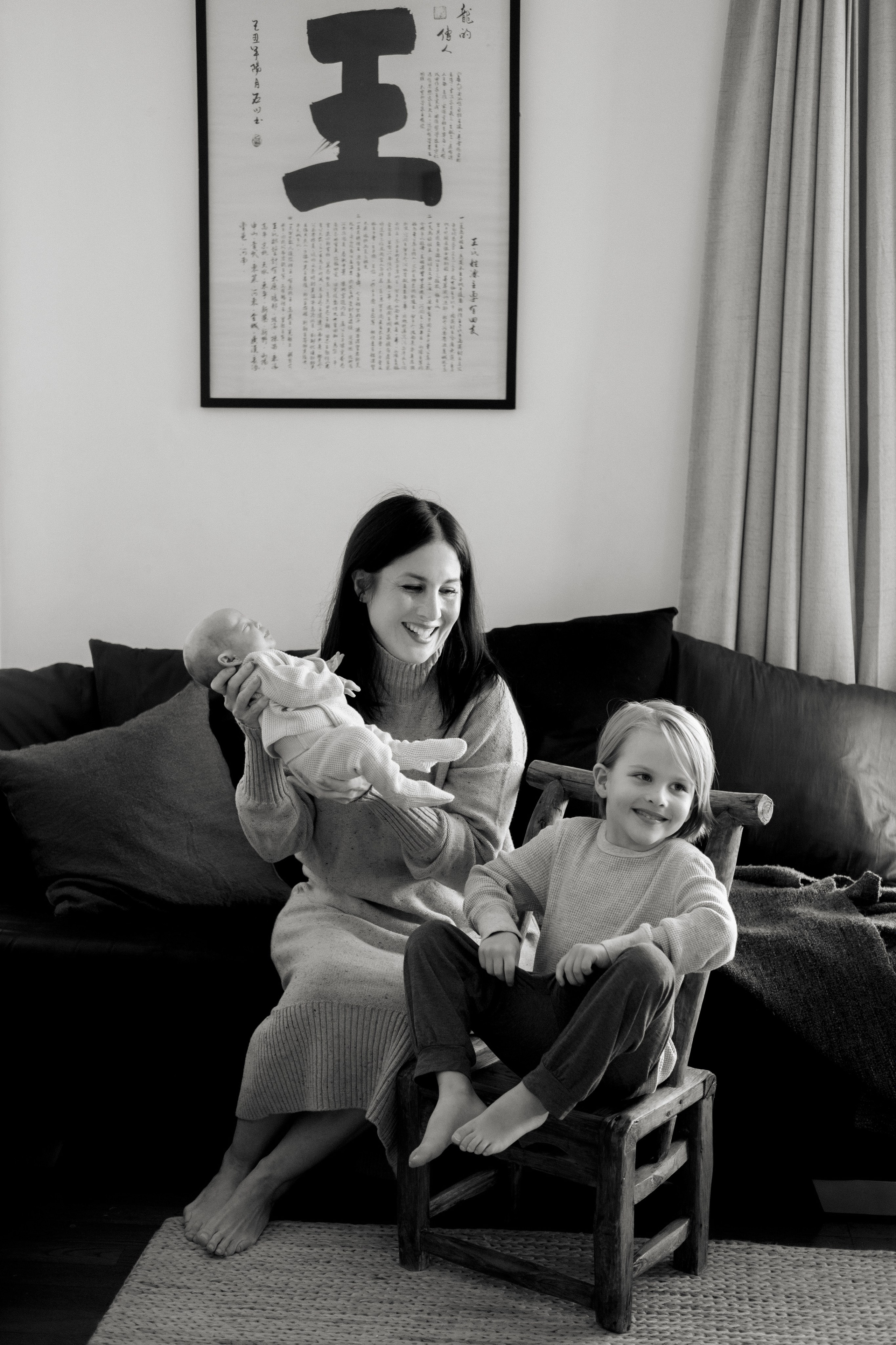 Mother embracing her child with a warm, loving smile in Richmond, VA.