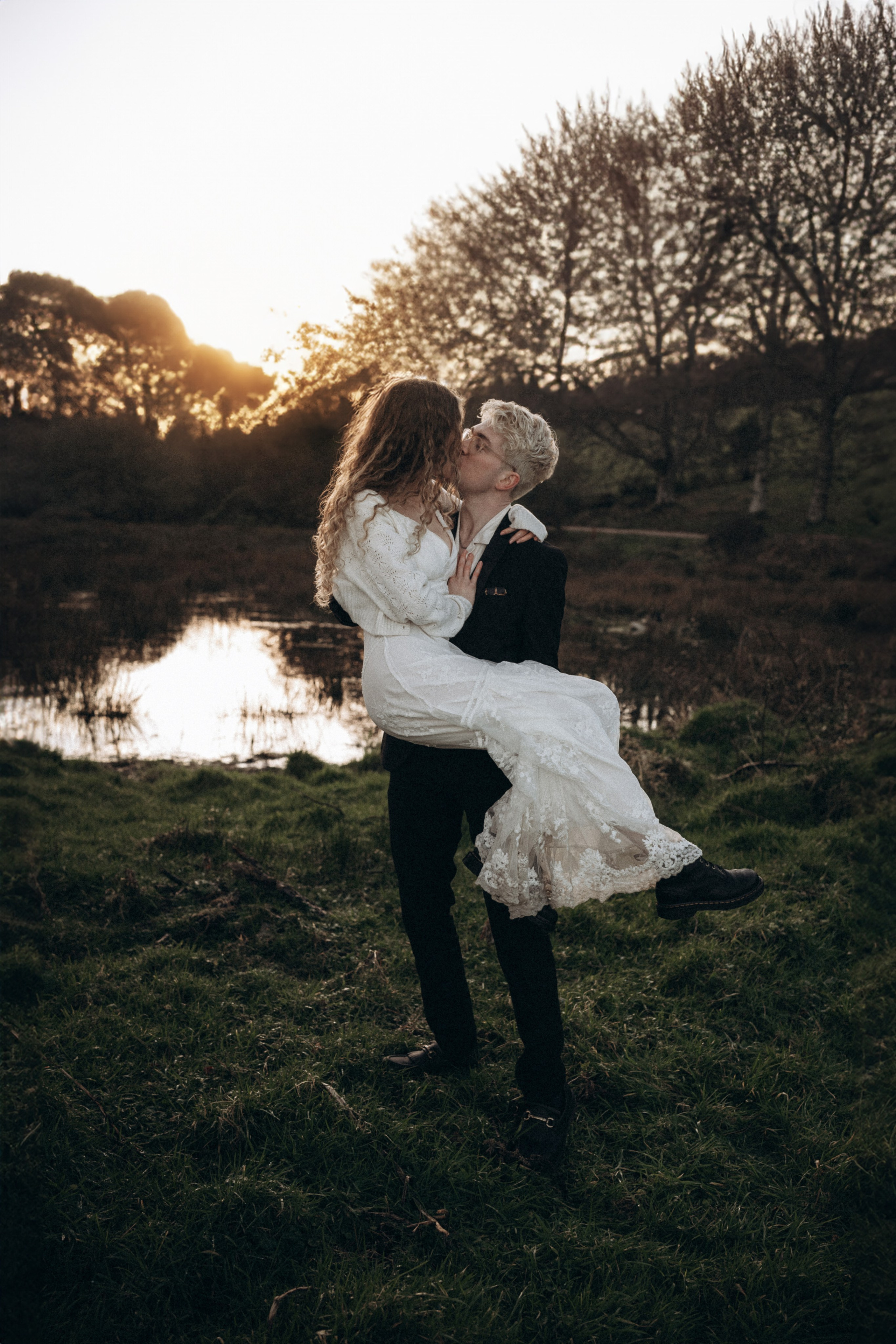 man carrying his bride