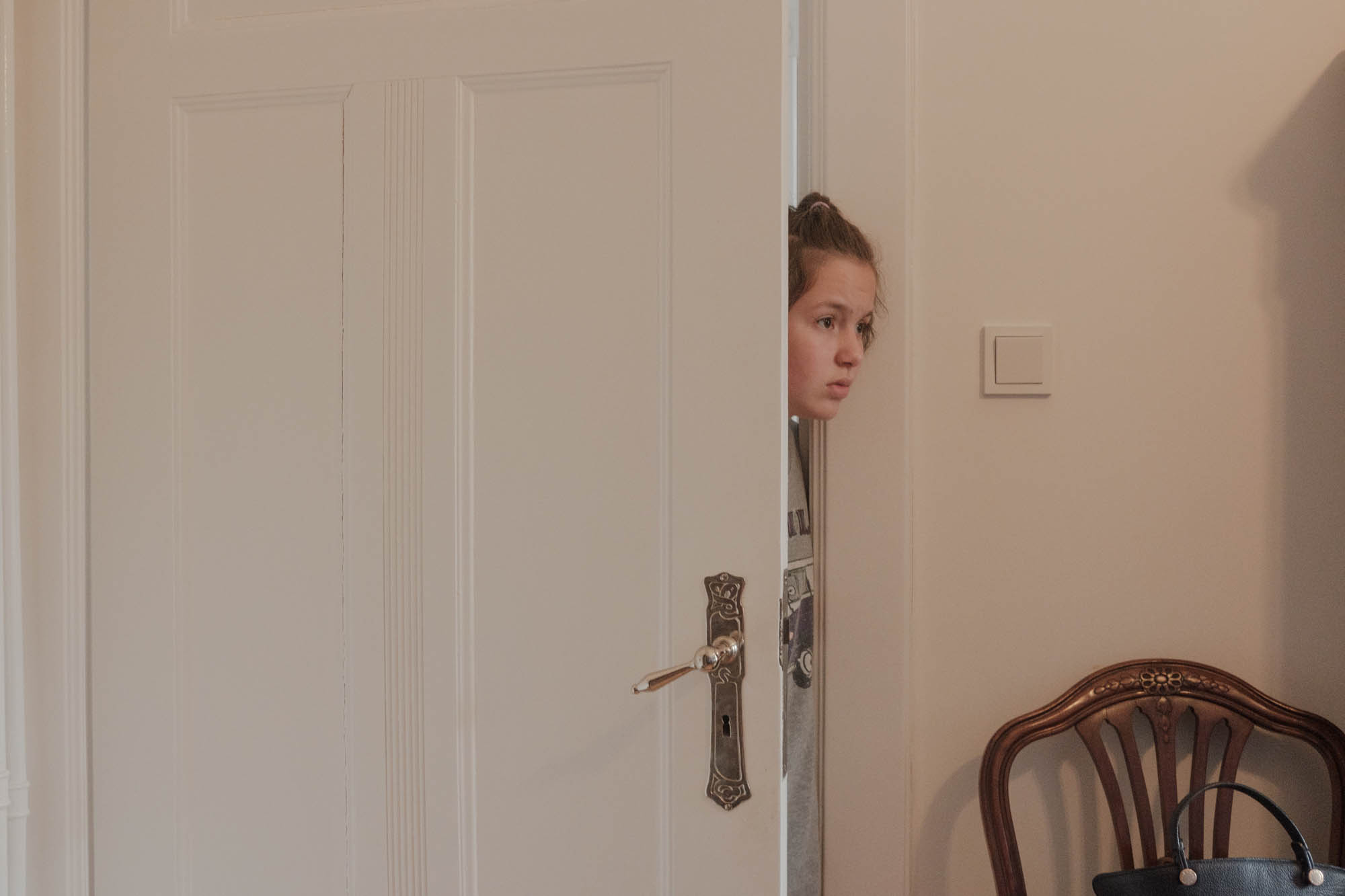 Sabrina asks permission to go outside with her mother Olga, April, 2022