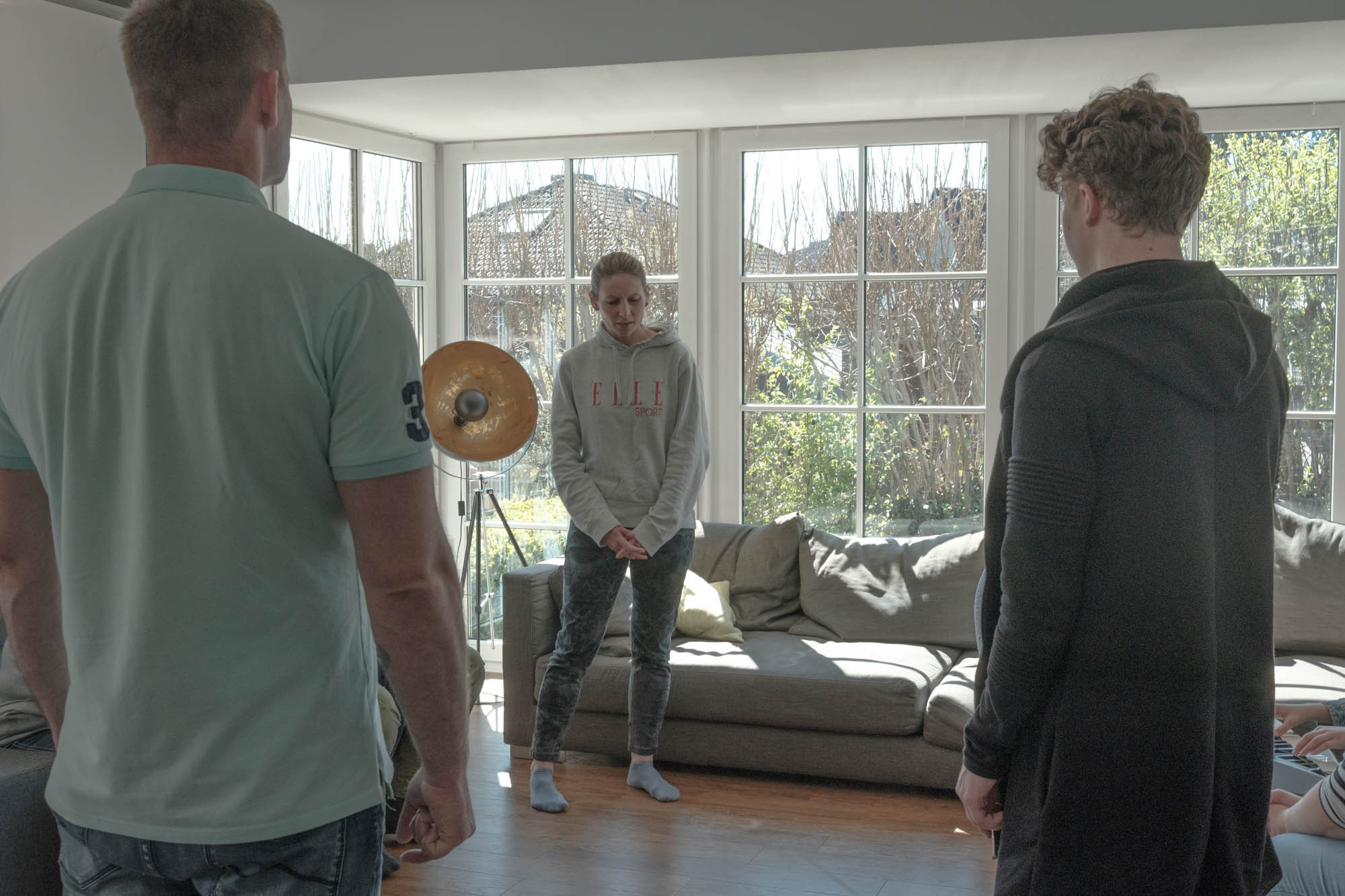 Olga is praying with other Ukrainians, April, 2022