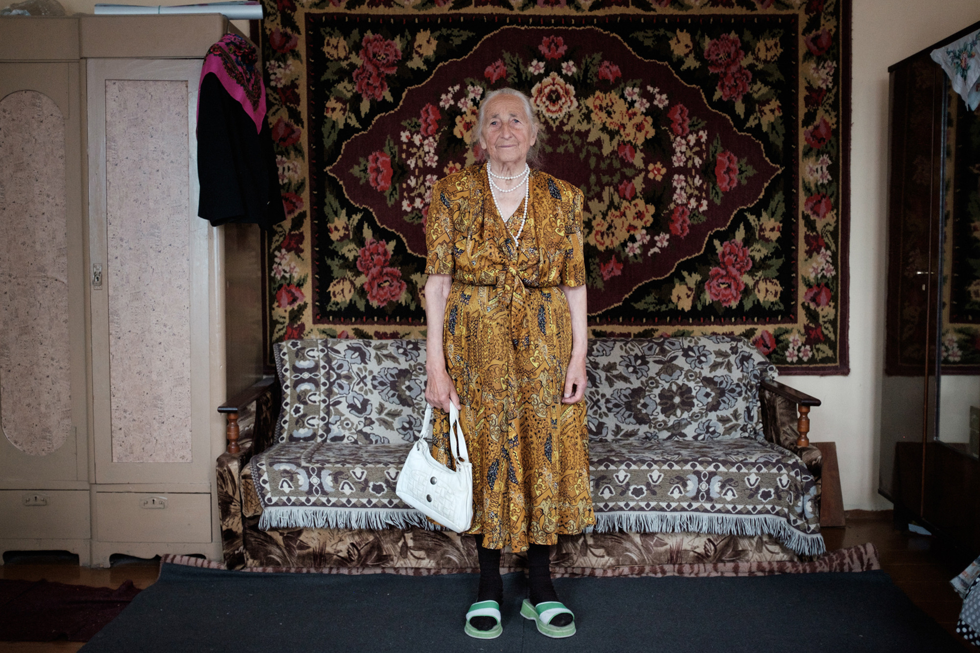 Vera bought this dress for her daughter, so that the money would not be lost after the collapse of the USSR. When her daughter got married Vera decided to keep the dress.