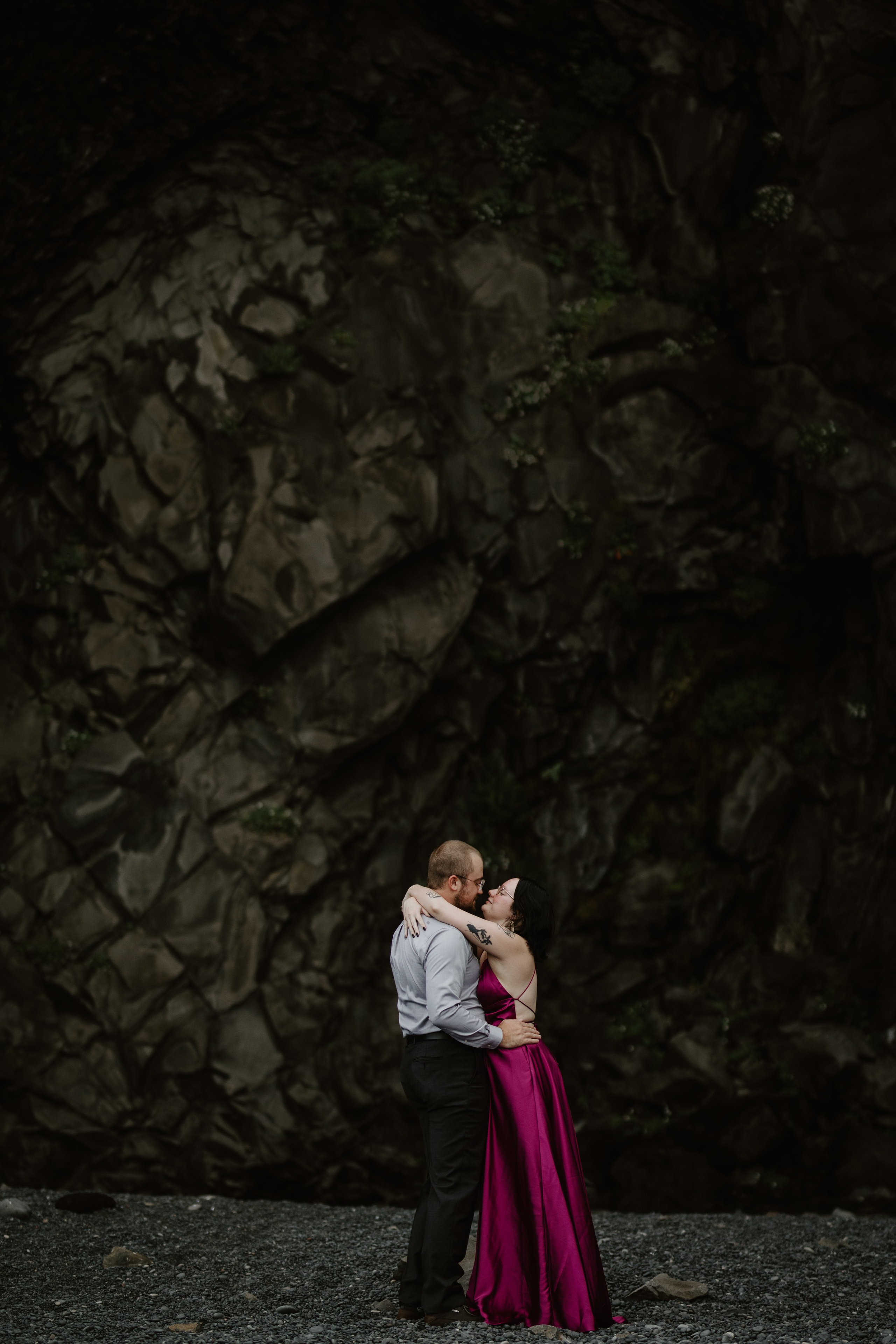 "Intimate couple’s photoshoot in Iceland’s rugged nature, surrounded by waterfalls and mountains.