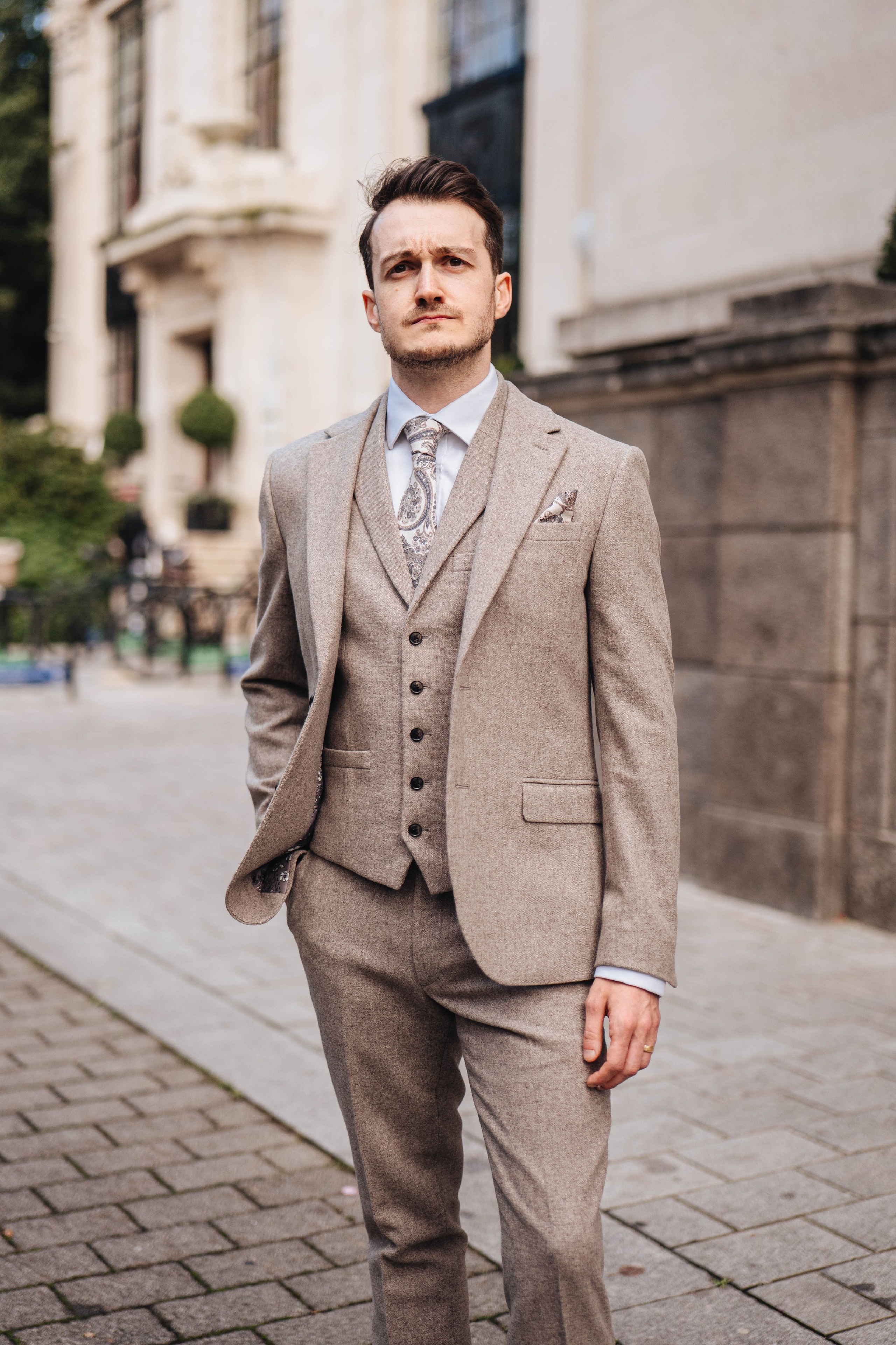 Wedding photography in london, groom in light 