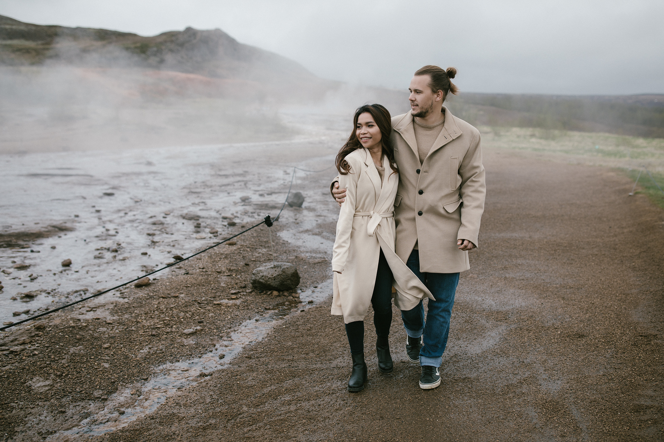 Couple photography by Icelandic hot springs during elopement
