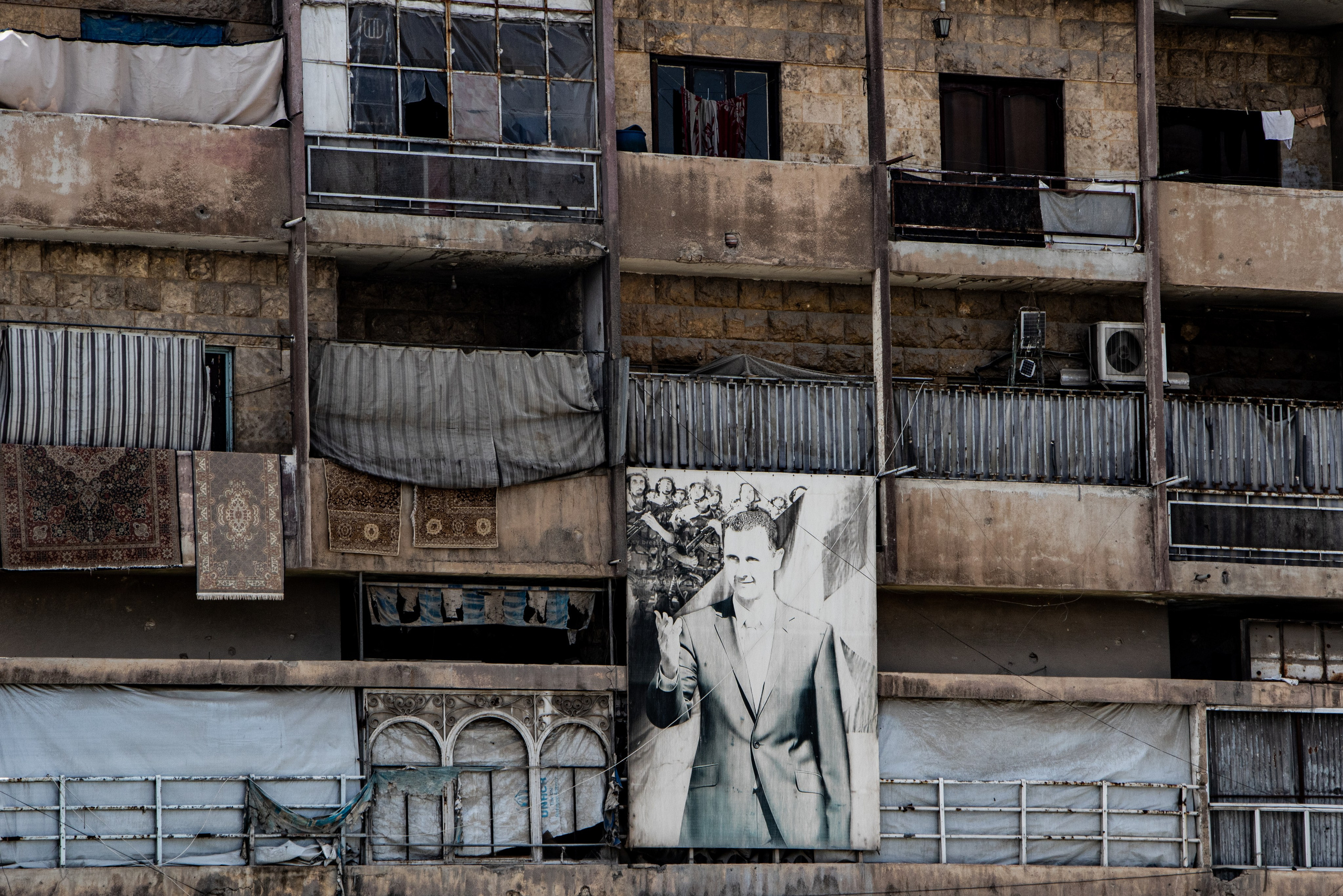 Portrait de Bachar al-Assad dans la vieille ville d'Alep.