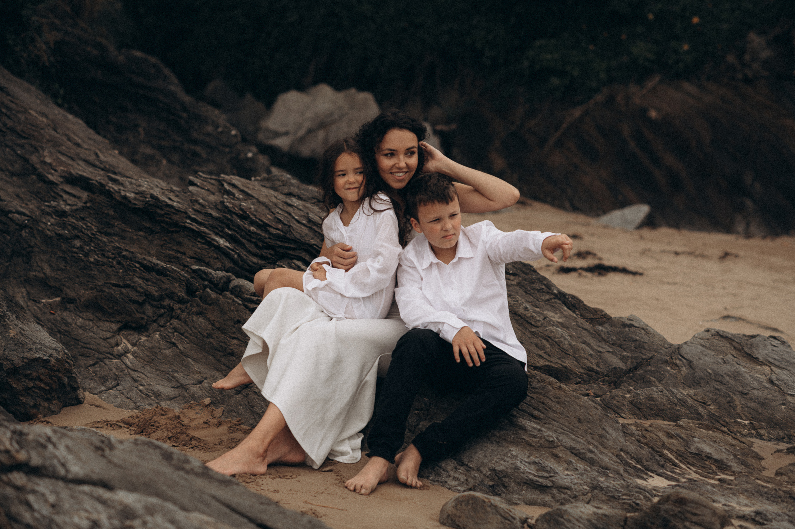 mother and children on the beach