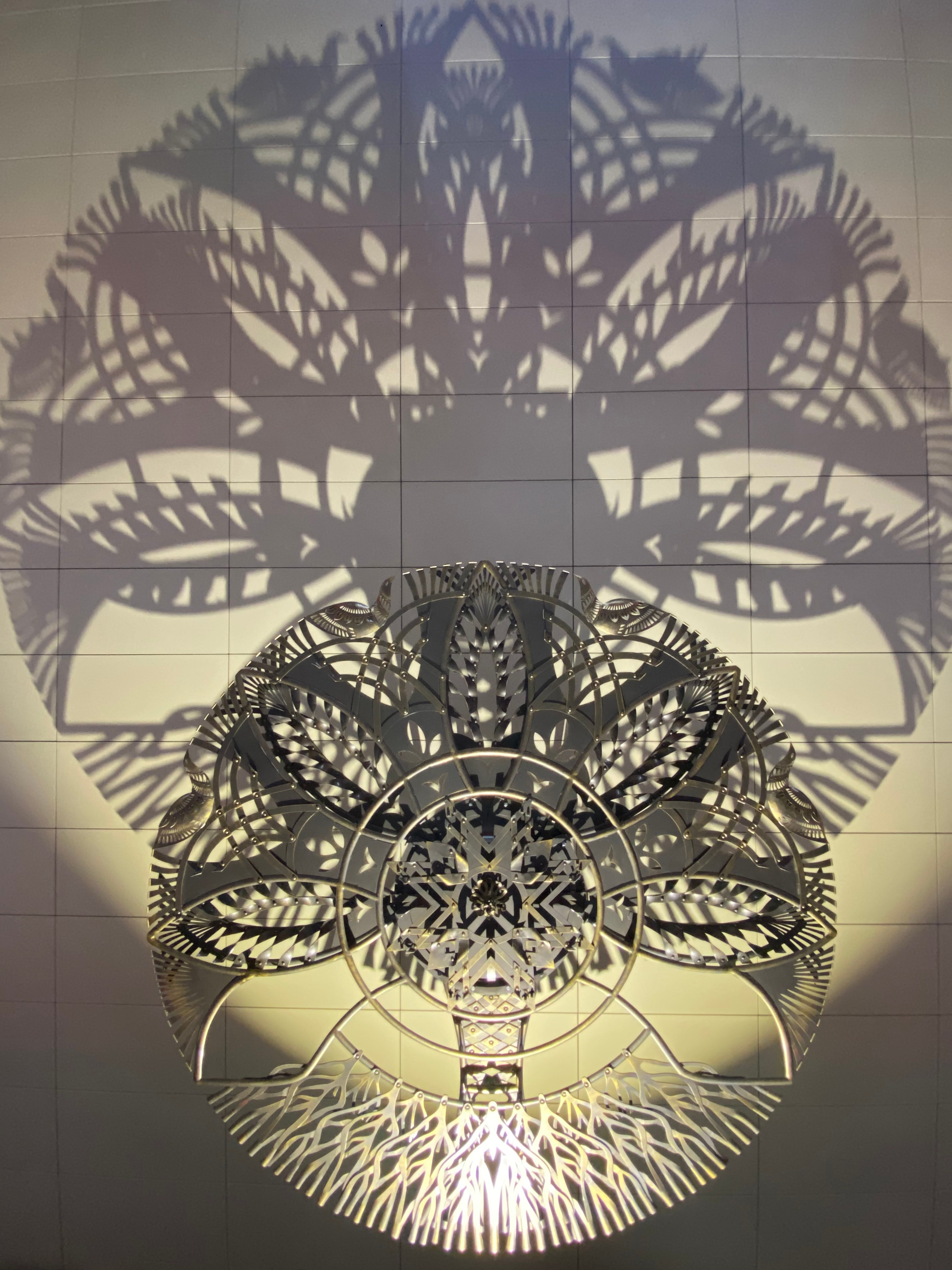 Минское Метро. Станция «Ковальская слобода». 2019-2020 «КАВАЛЬСКIЯ ВЫЦIНАНКI» кованые подвесные светотеневые композиции, декоративные элементы. Сталь, художественная ковка, лазерная резка, сварка. Художники Мария Тарлецкая, Павел Войницкий, Архитекторы Владимир Телепнёв, Ольга Телепнёва, Анна Кузмич. По мотивам произведений Елизаветы Червонцевой и Молодечненской школы вытинанки. Перонн. Перонный зал.